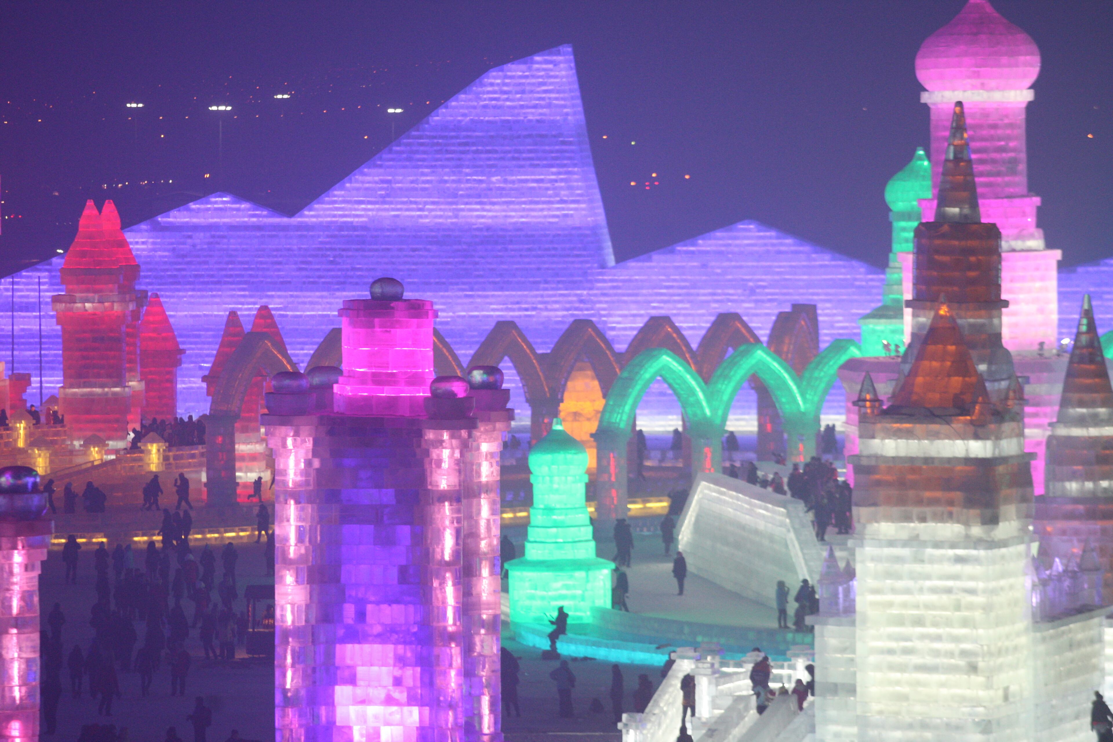 HARBIN, CHINA - DECEMBER 22: (CHINA OUT) Tourists visit the 17th Harbin Ice And Snow World during its test run on December 22, 2015 in Harbin, China. The event will run from December 25, 2015 to February 25, 2016. (Photo by ChinaFotoPress/ChinaFotoPress via Getty Images)