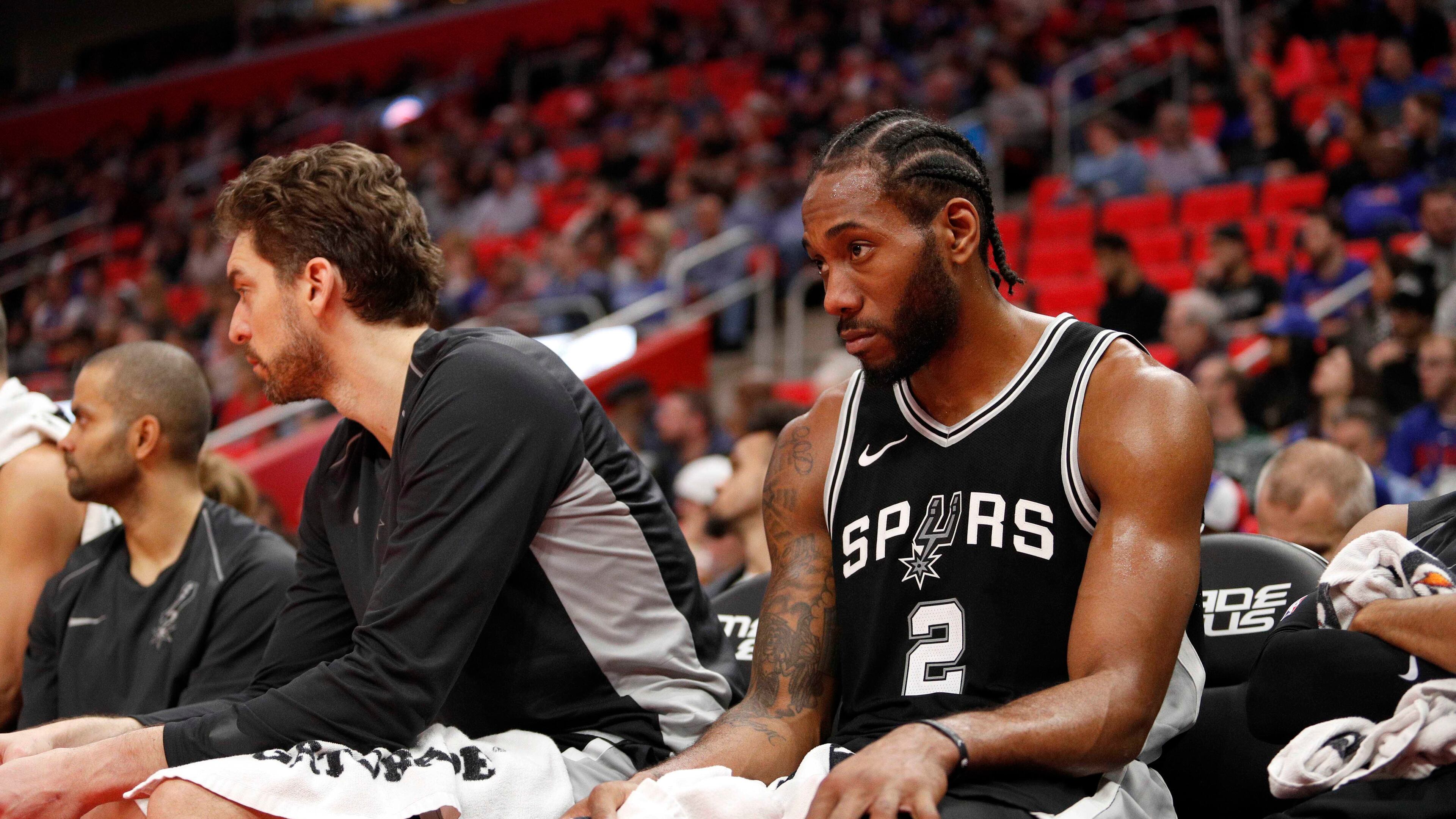 San Antonio Spurs forward Kawhi Leonard (2) sits on the bench during the fourth quarter against the Detroit Pistons at Little Caesars Arena.