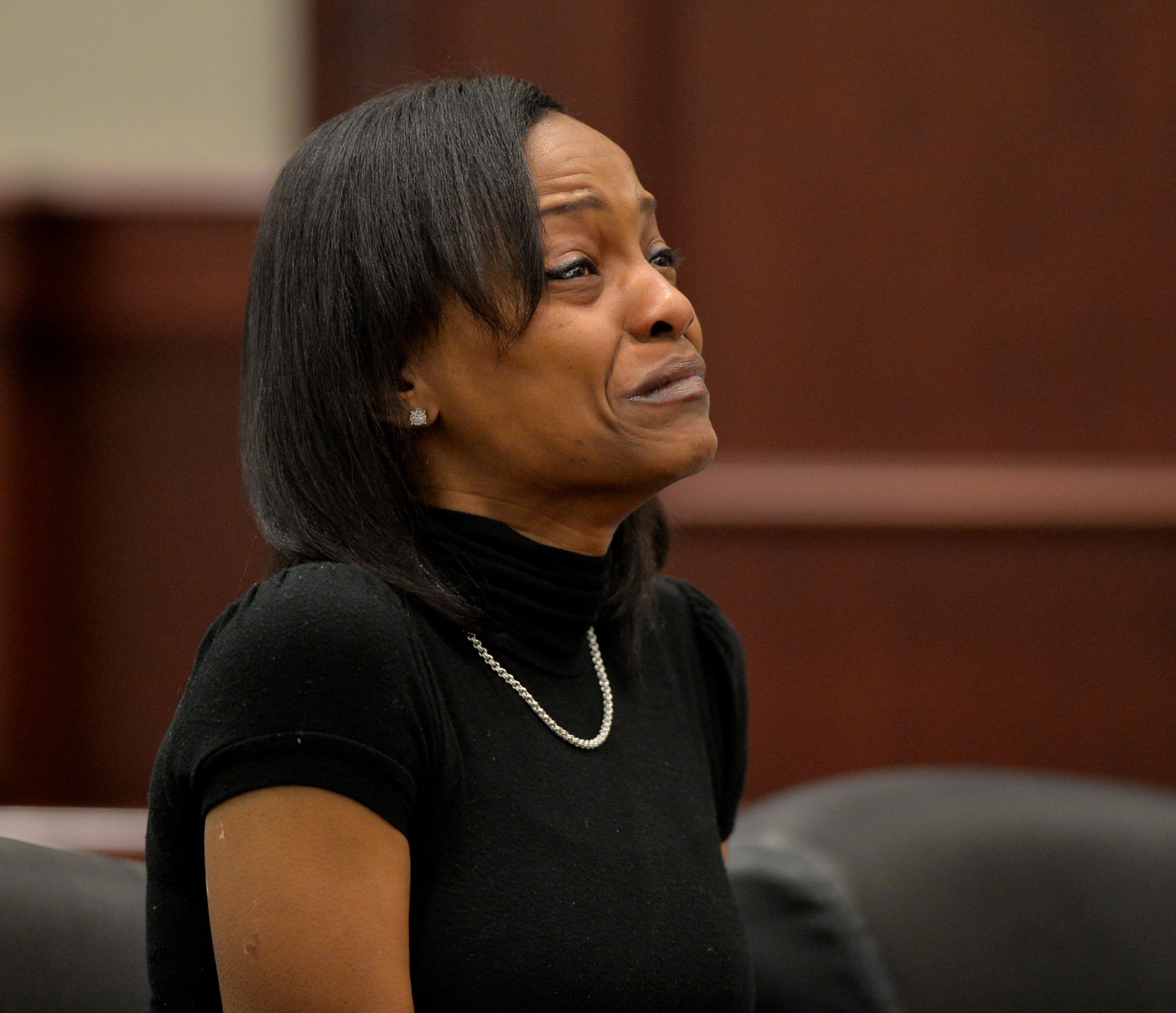 Marlo Maria Fallings, owner of Marlo’s Magnificent Learning Center, (in black) becomes emotional as she appears in Clayton County Superior Court for sentencing Tuesday, May 20, 2014. Fallings was sentenced to spend 90 days in the Clayton County Jail and then another nine months on probation for the reckless conduct conviction a month ago for the death of Jazmin Green.