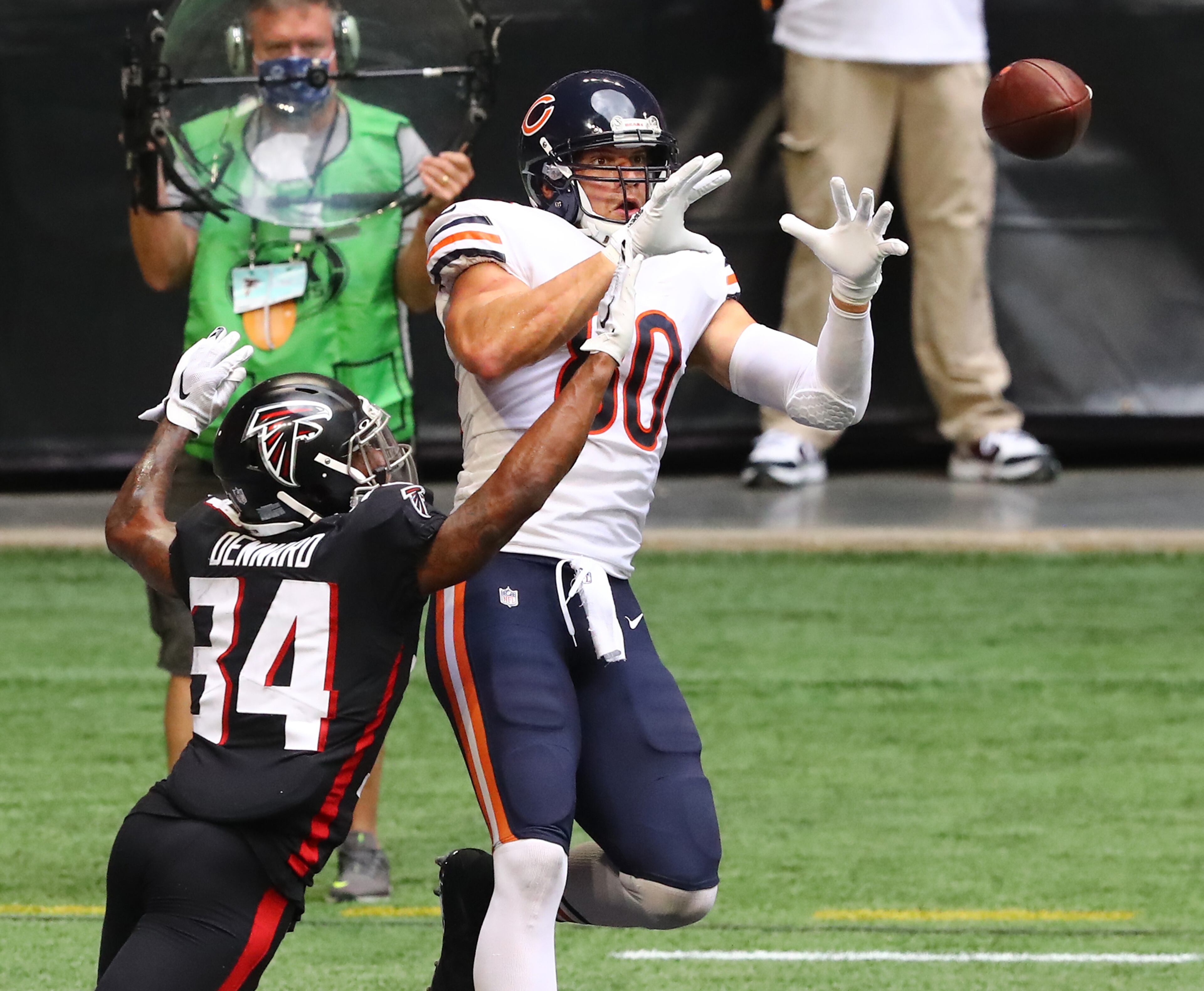 Bears tight end Jimmy Graham catches a touchdown pass against Atlanta Falcons cornerback Darqueze Dennard to cut the Falcons lead to 26-16 during the fourth quarter in an NFL football game on Sunday, Sept. 27, 2020 in Atlanta. The Bears scored 20 points in the fourth quarter for a 30-26 come from behind victory. (Curtis Compton / Curtis.Compton@ajc.com)