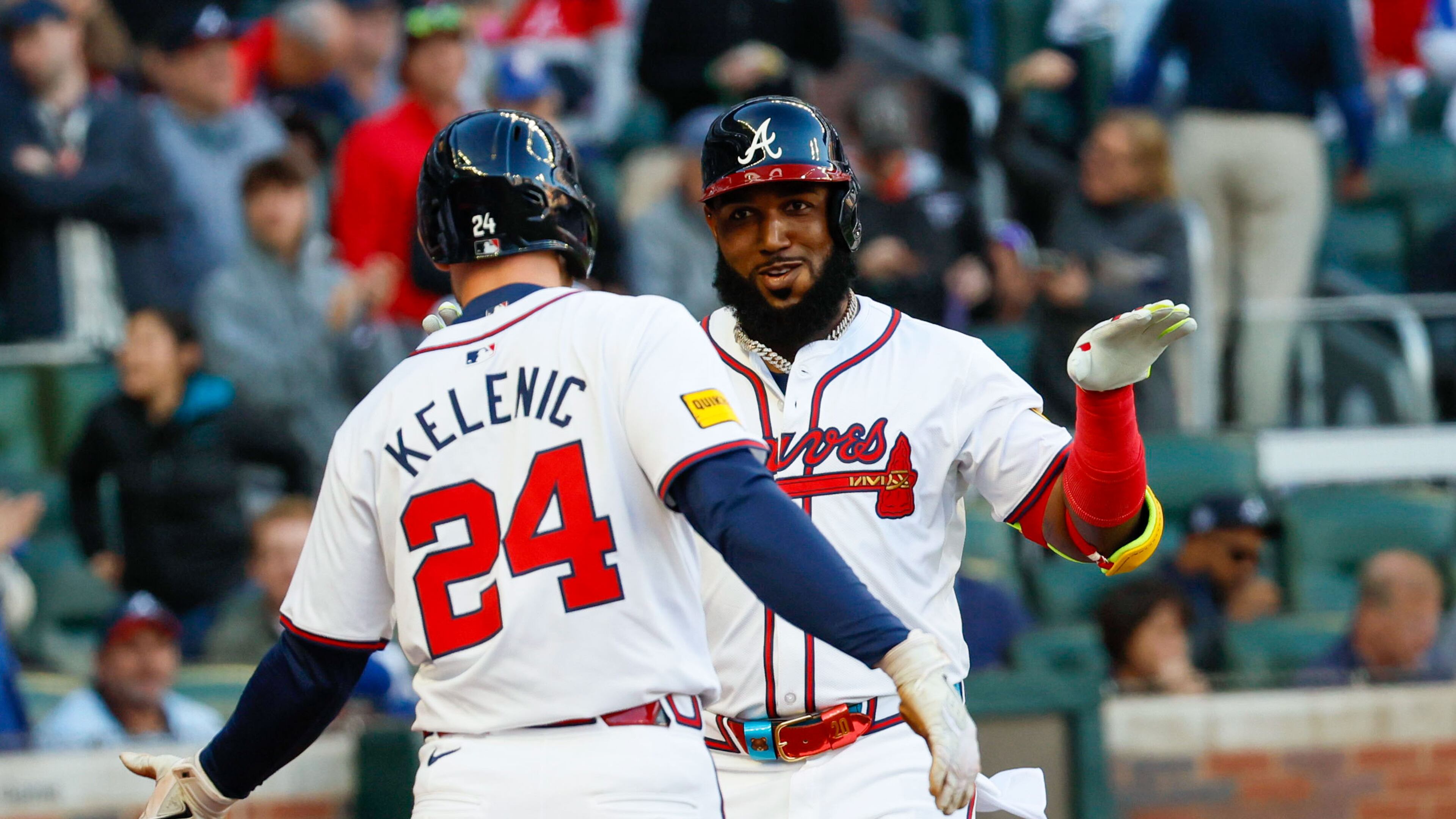 Atlanta Braves designated hitter Marcell Ozuna celebrates with outfielder Jarred Kelenic (24) after hitting a three-run home run during the first inning against the Texas Rangers at Truist Park on Sunday, April 21, 2024, in Atlanta.
(Miguel Martinez/ AJC)