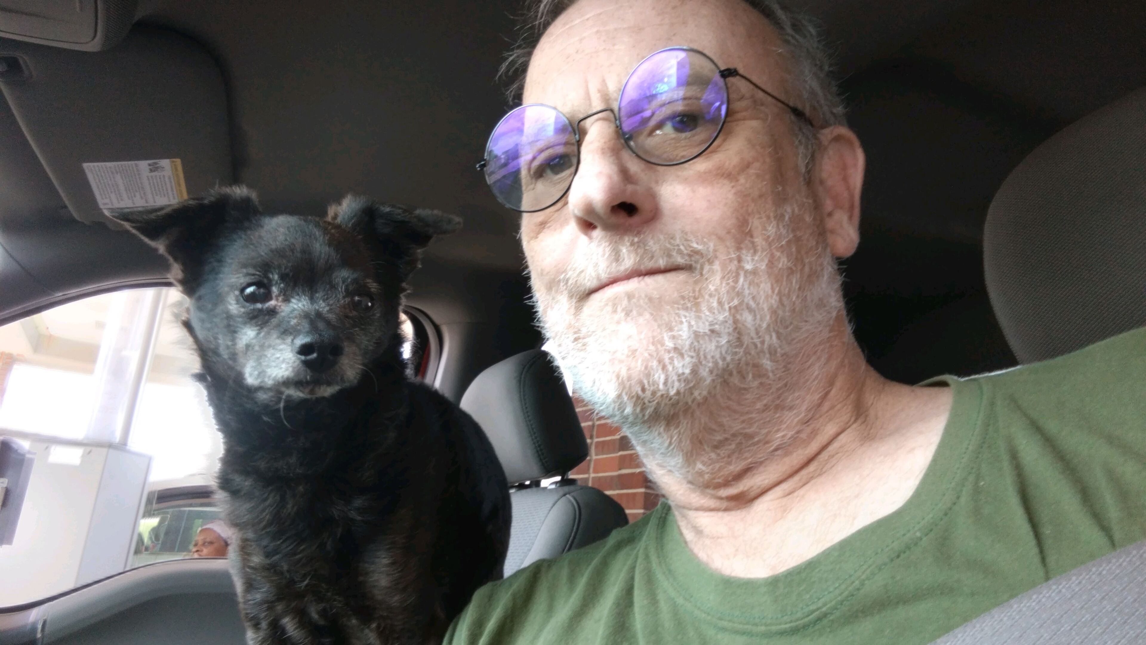 Rodney Davidson with his dog Alvin. Davidson has struggled to get veteran disability benefits and health care since his discharge from the Georgia Army National Guard in 2006. Courtesy of Danielle Jones