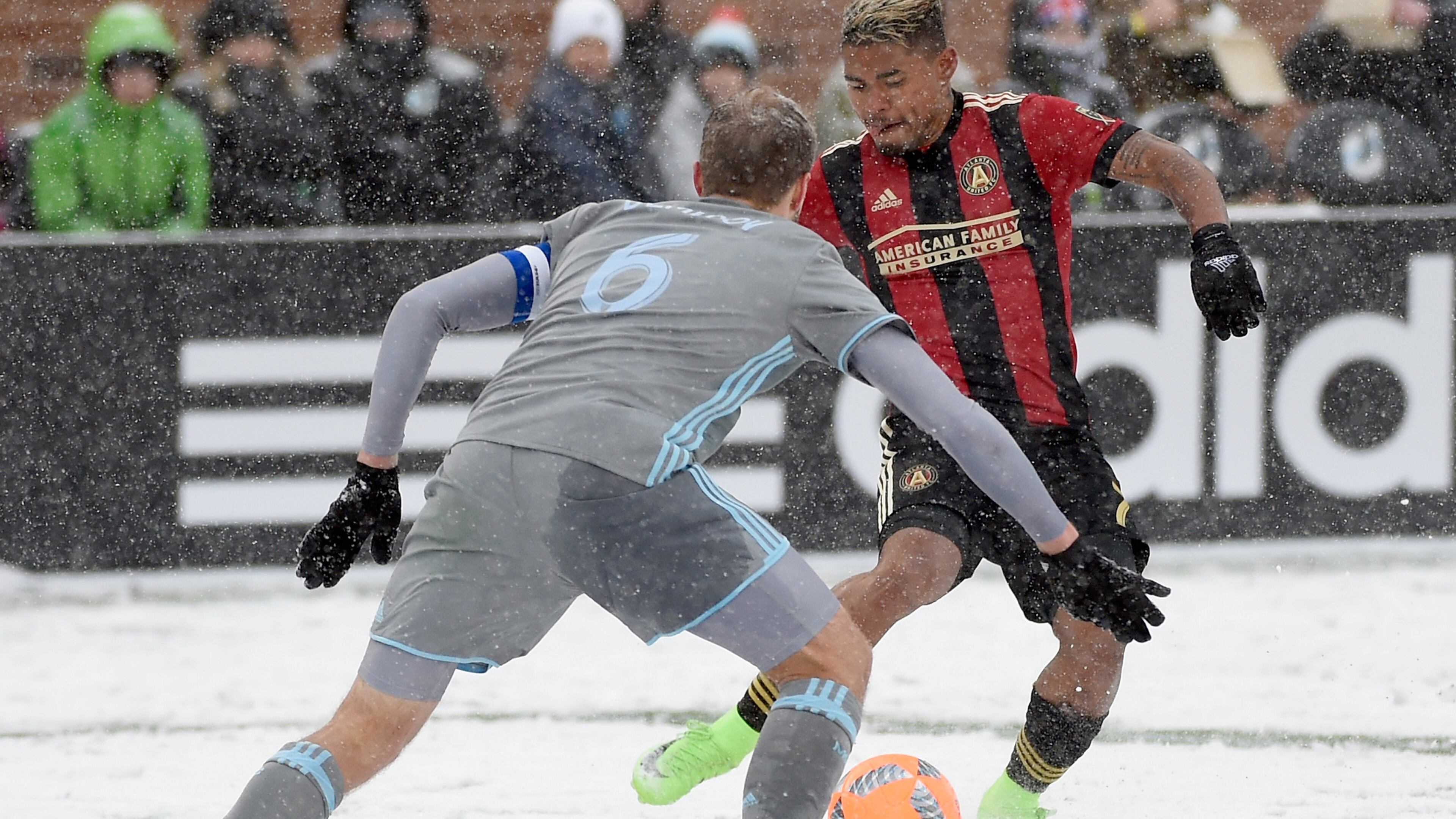 Atlanta United's Josef Martinez controls the ball against Vladim Demidov of Minnesota United during the second half of a snow-filled match March 12, 2017 at TCF Bank Stadium in Minneapolis.