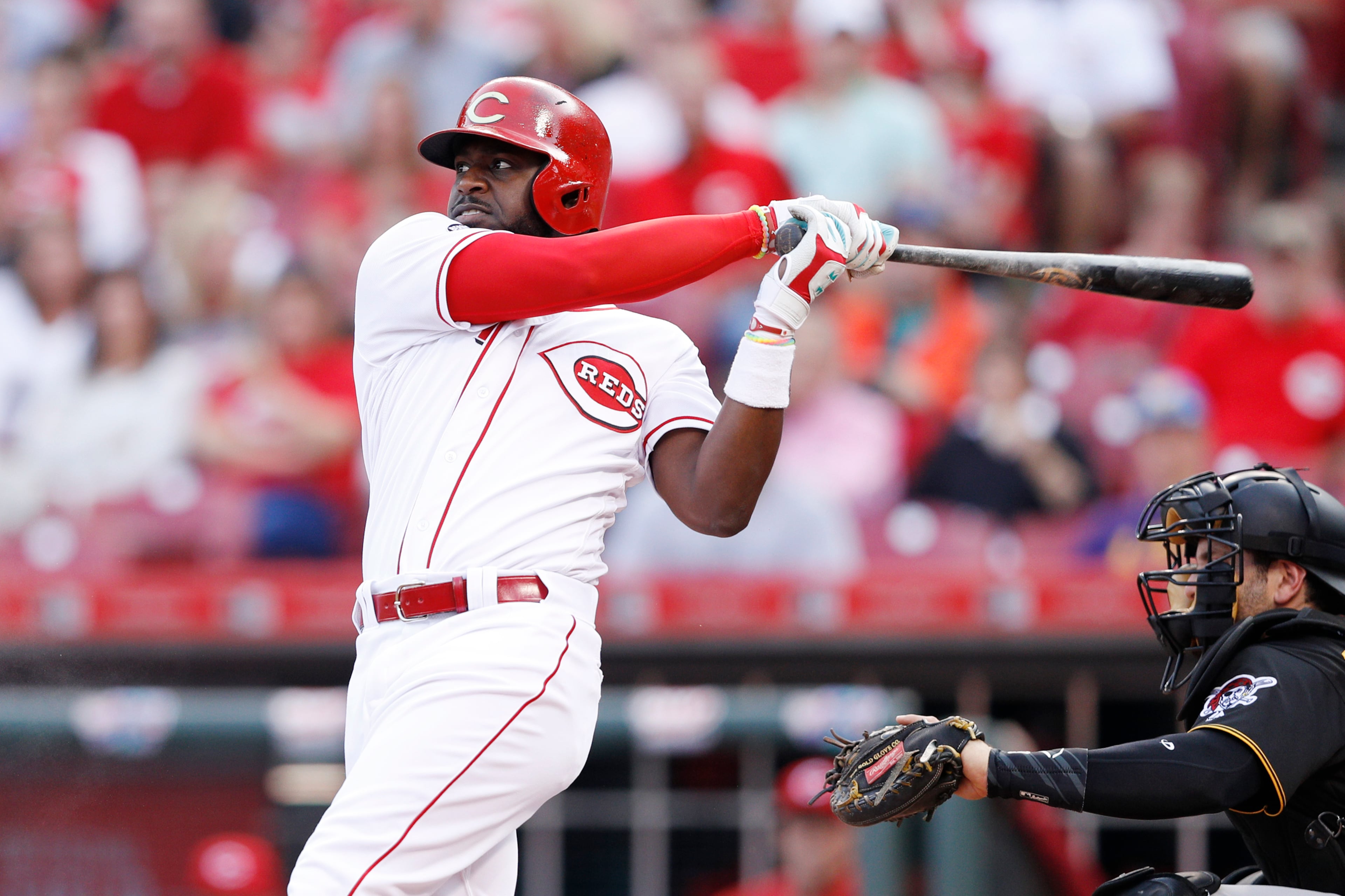 CINCINNATI, OH - MAY 11: Brandon Phillips #4 of the Cincinnati Reds drives in a run with a single to center field against the Pittsburgh Pirates in the first inning of the game at Great American Ball Park on May 11, 2016 in Cincinnati, Ohio. (Photo by Joe Robbins/Getty Images)