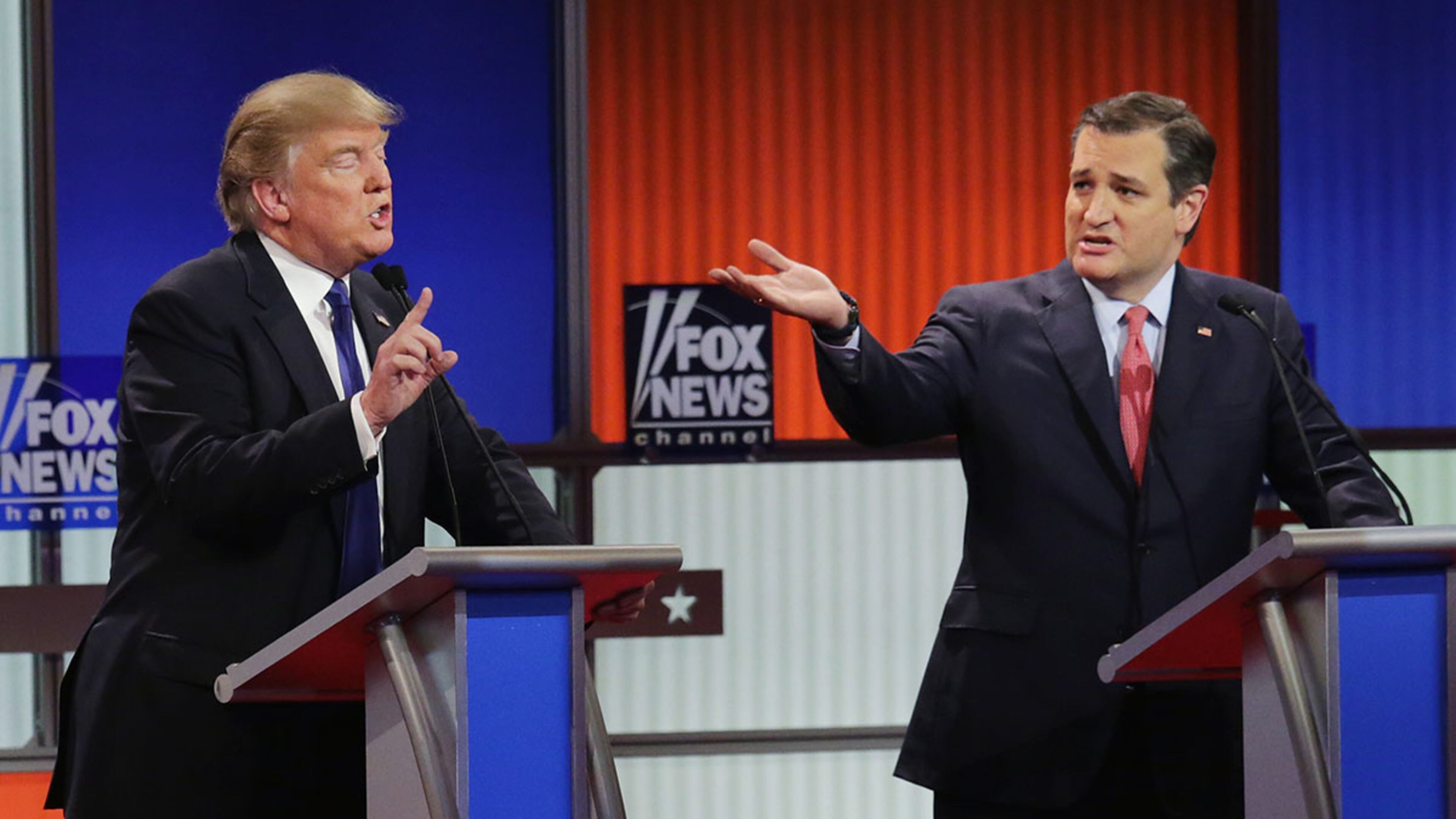 Republican presidential candidates Donald Trump (left) and Sen. Ted Cruz (R-TX) debate a point Thursday night in Detroit. Chip Somodevilla / Getty Images)