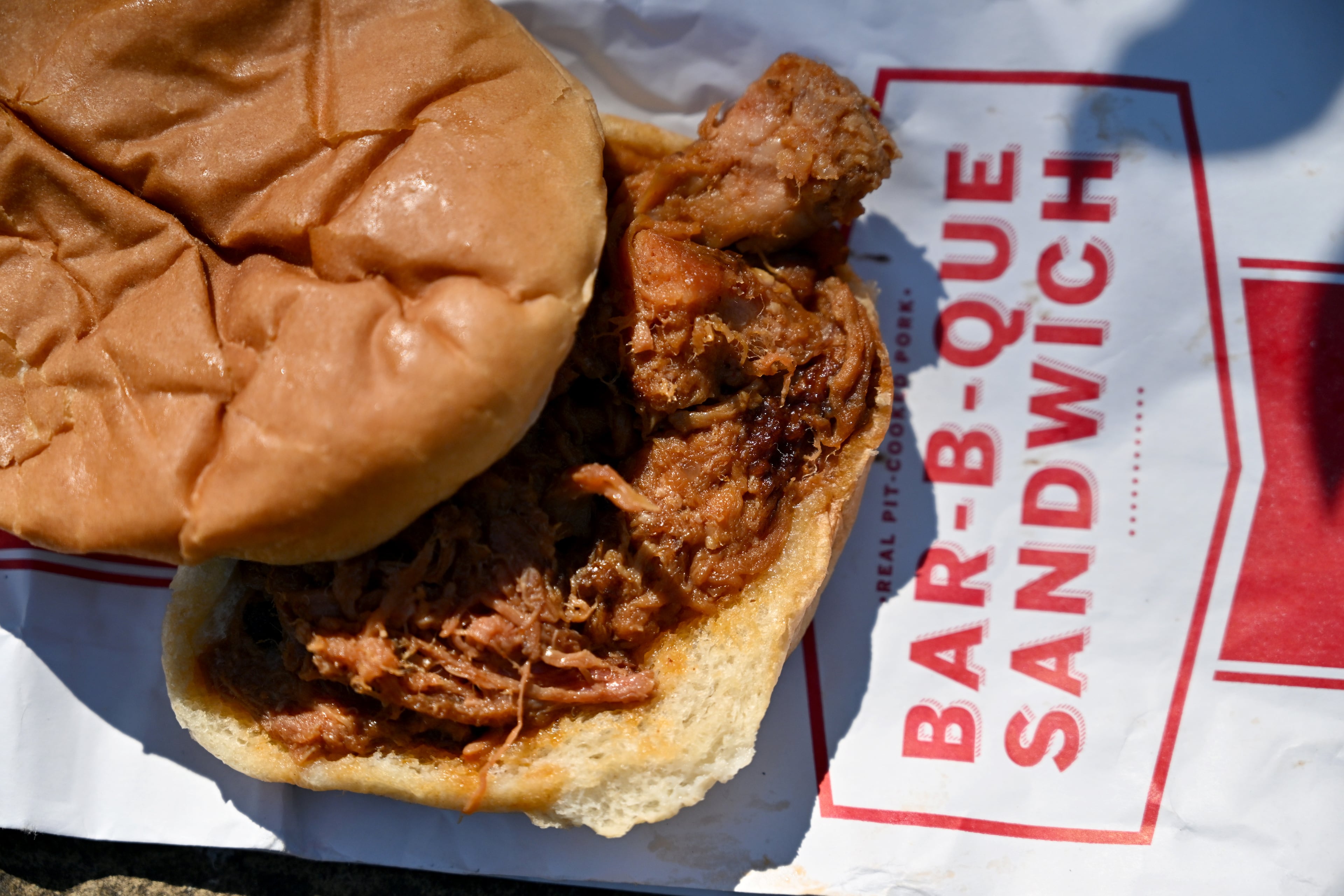The pork bar-b-que sandwich makes a perfect early dinner while at Augusta National Golf Course. (Hyosub Shin/AJC)