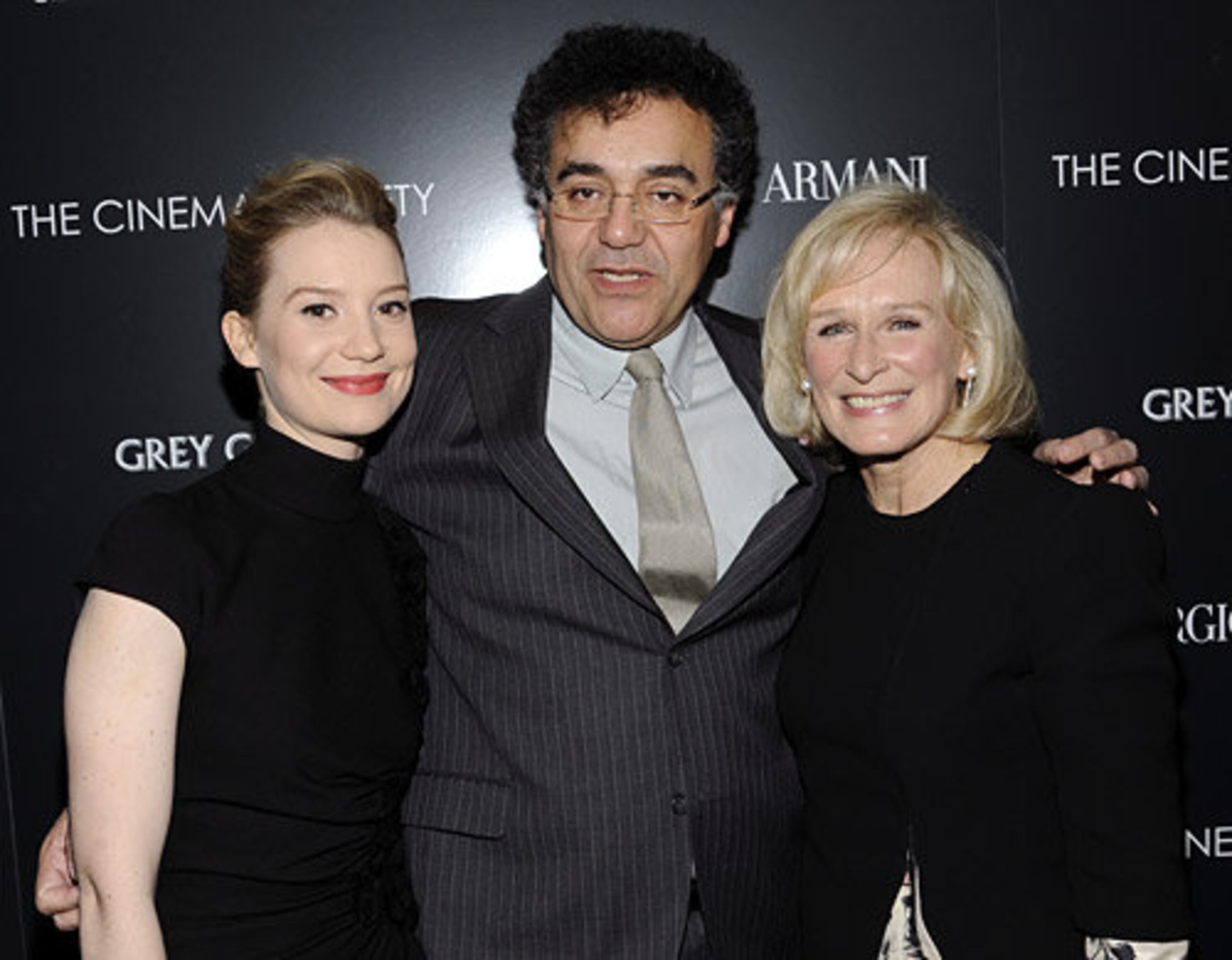 Director Rodrigo Garcia, center, poses with actors Mia Wasikowska, left, and Glenn Close at a special screening of "Albert Nobbs", hosted by the Cinema Society and Giorgio Armani at the Museum of Modern Art on Tuesday, Dec. 13, 2011 in New York. In the forthcoming film, set in 19th-century Ireland, Close plays painfully shy butler Albert Nobbs, who hides an incredible secret: he is really a she.