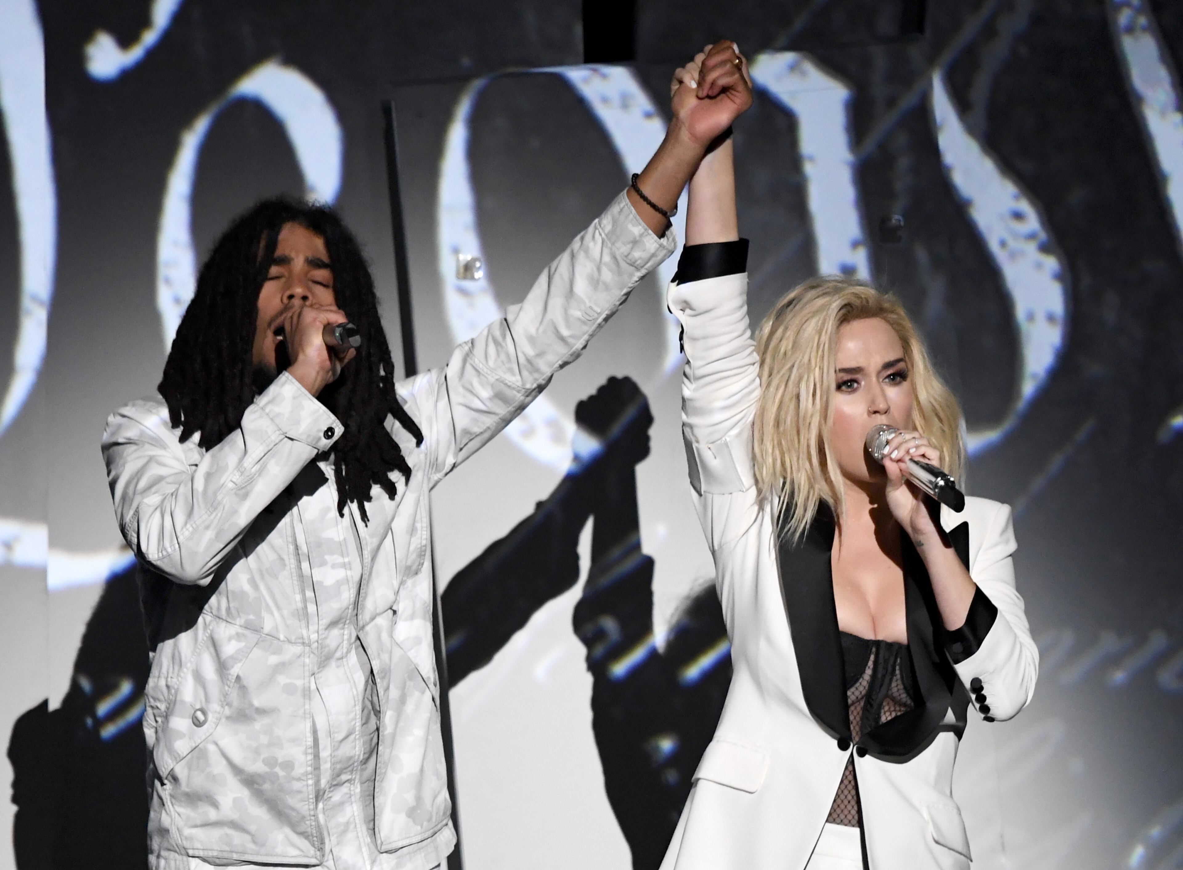 LOS ANGELES, CA - FEBRUARY 12: Recording artists Skip Marley (L) and Katy Perry perform onstage during The 59th GRAMMY Awards at STAPLES Center on February 12, 2017 in Los Angeles, California. (Photo by Kevin Winter/Getty Images for NARAS)