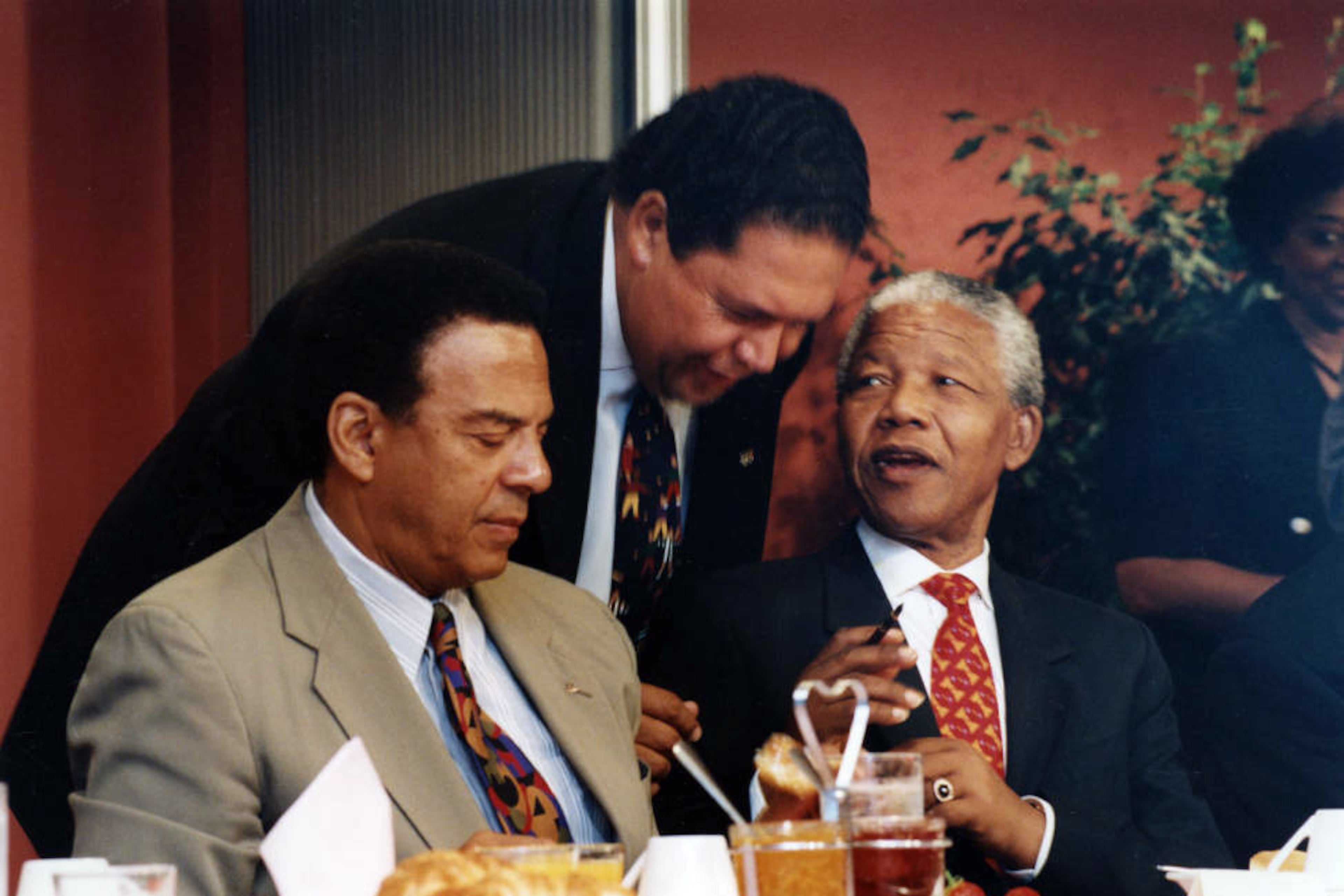 Andrew Young, Maynard Jackson and Nelson Mandela talking together, Atlanta, Georgia, July 12, 1993. (W.A. Bridges/AJC file photo)