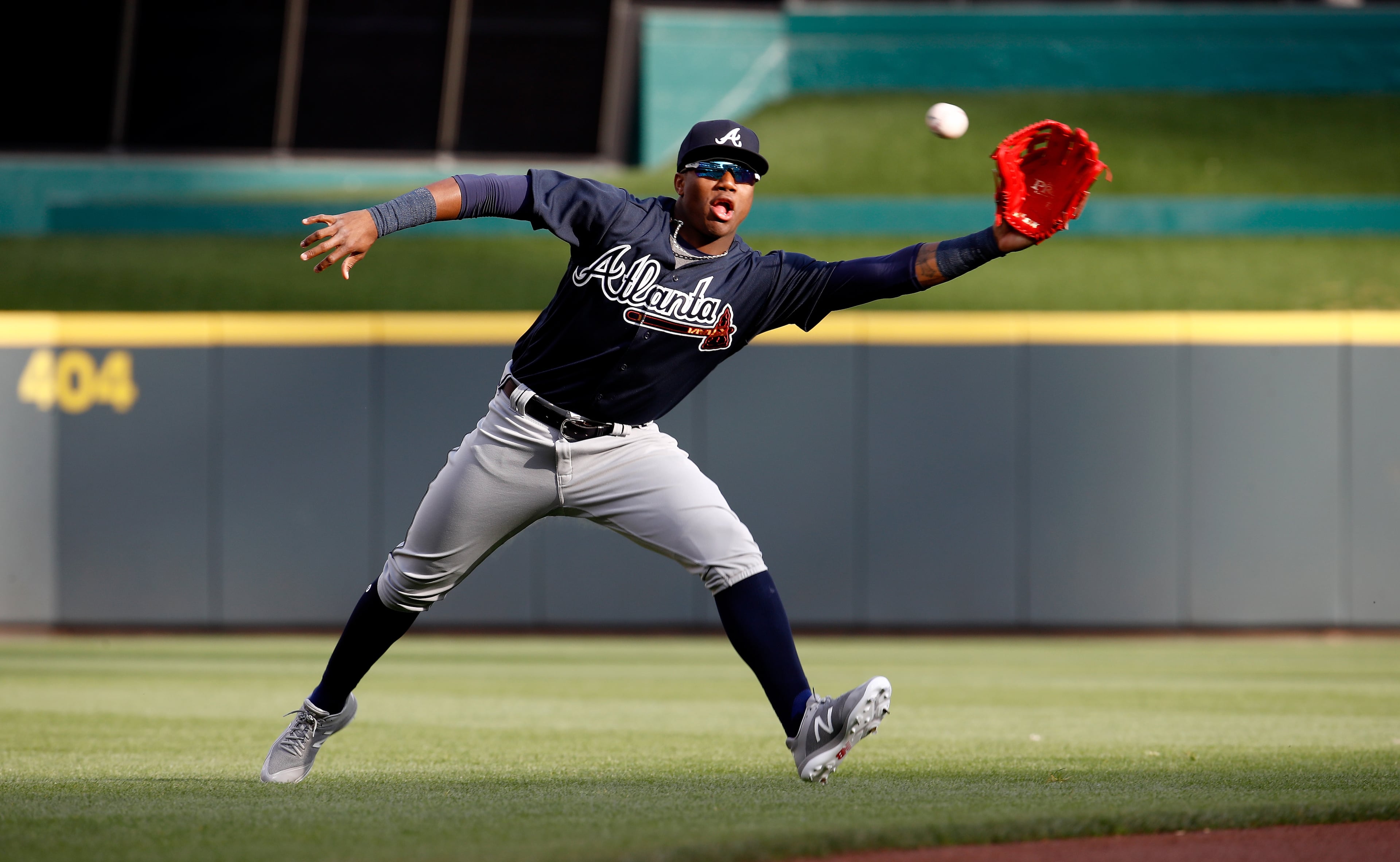 CINCINNATI, OH - APRIL 25: Ronald Acuna #13 of the Atlanta Braves warms up before his first MLB game against the Cincinnati Reds at Great American Ball Park on April 25, 2018 in Cincinnati, Ohio. (Photo by Andy Lyons/Getty Images)