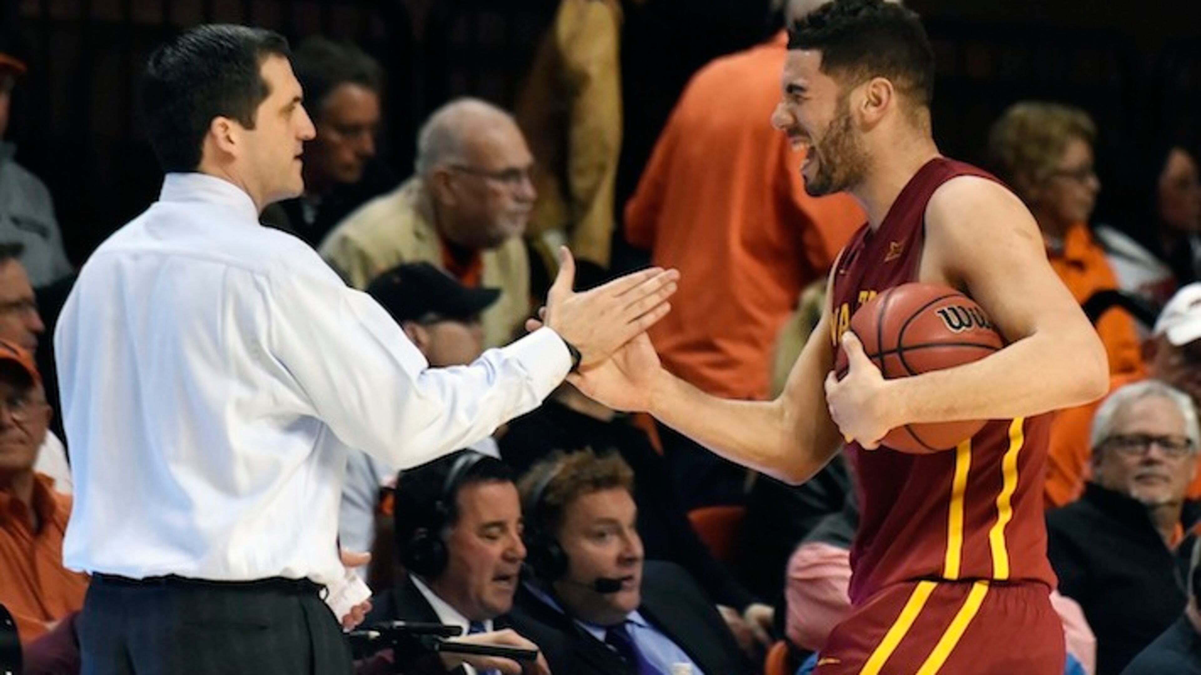 Iowa State guard Georges Niang, right, celebrates with head coach Steve Prohm following an NCAA college basketball game in Stillwater, Okla., Saturday, Feb. 6, 2016. Niang led Iowa State scoring with 18 points in the 64-59 win over Oklahoma State.(AP Photo/Brody Schmidt)