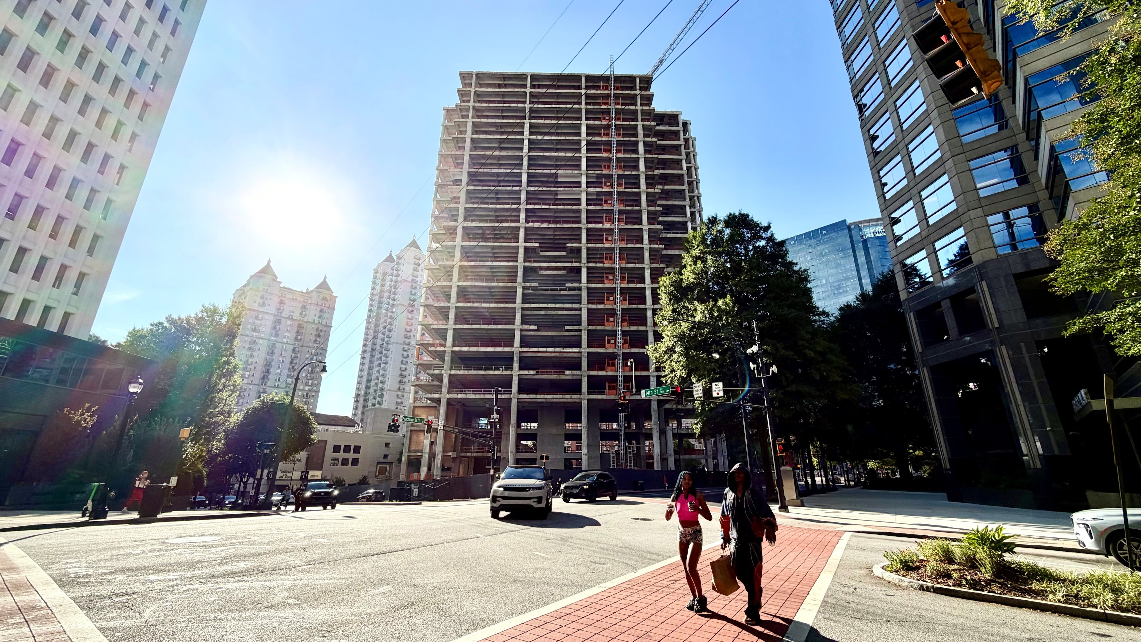 The Campanile building at the corner of Peachtree and 14th streets as seen earlier this month. Developer John Dewberry has proposed a significant overhaul to the tower, which he has dubbed the Midtowne, a project that has stalled with little visible progress for several years. It has drawn the ire of Midtown residents and efforts by the city to prod development. (J. Scott Trubey/AJC)