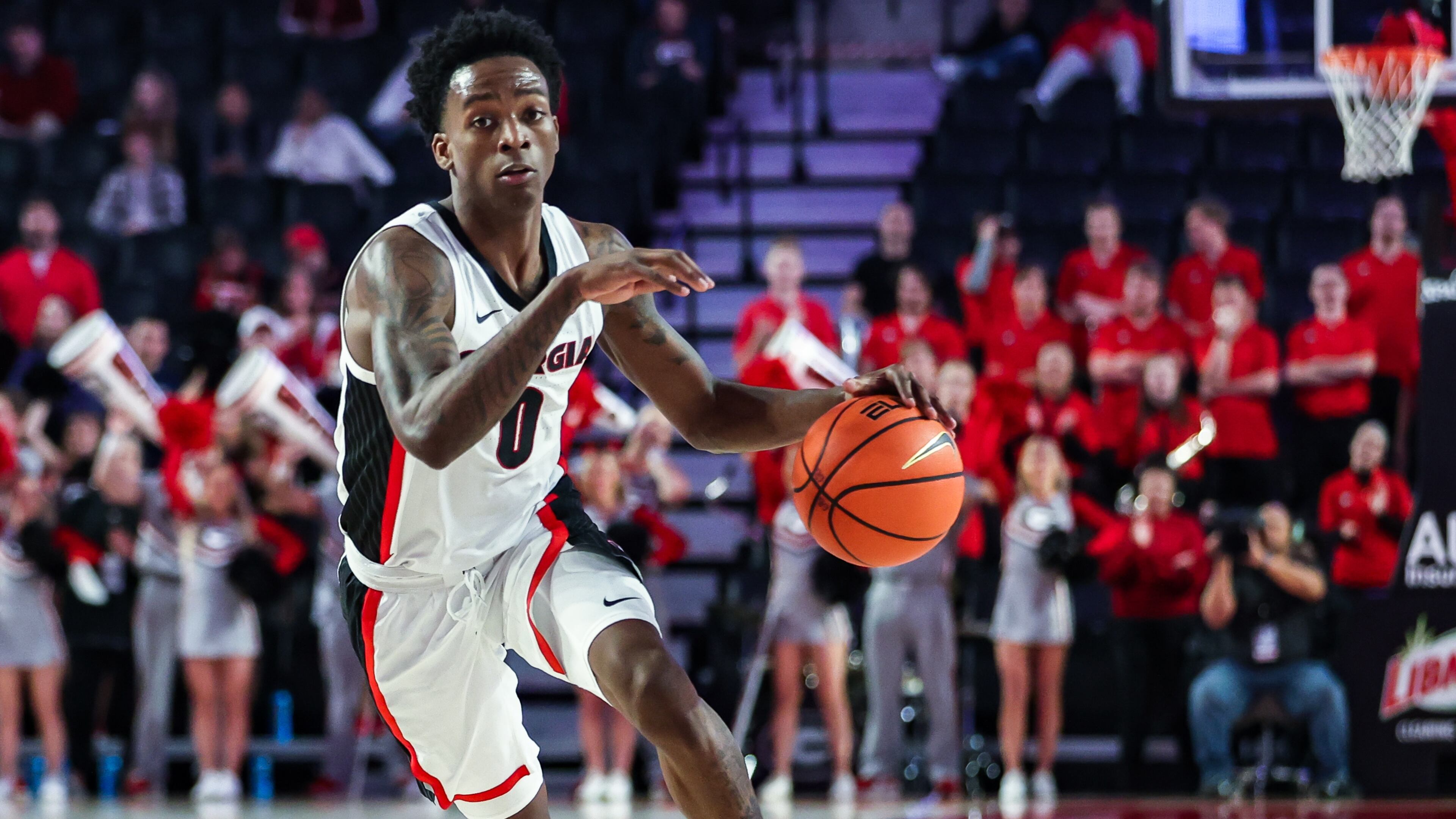 Georgia guard Terry Roberts (0) drives to the basket during a game against Bucknell at Stegeman Coliseum in, on Friday, Nov. 18, 2022. (Photo by Kayla Renie/UGA Athletics)