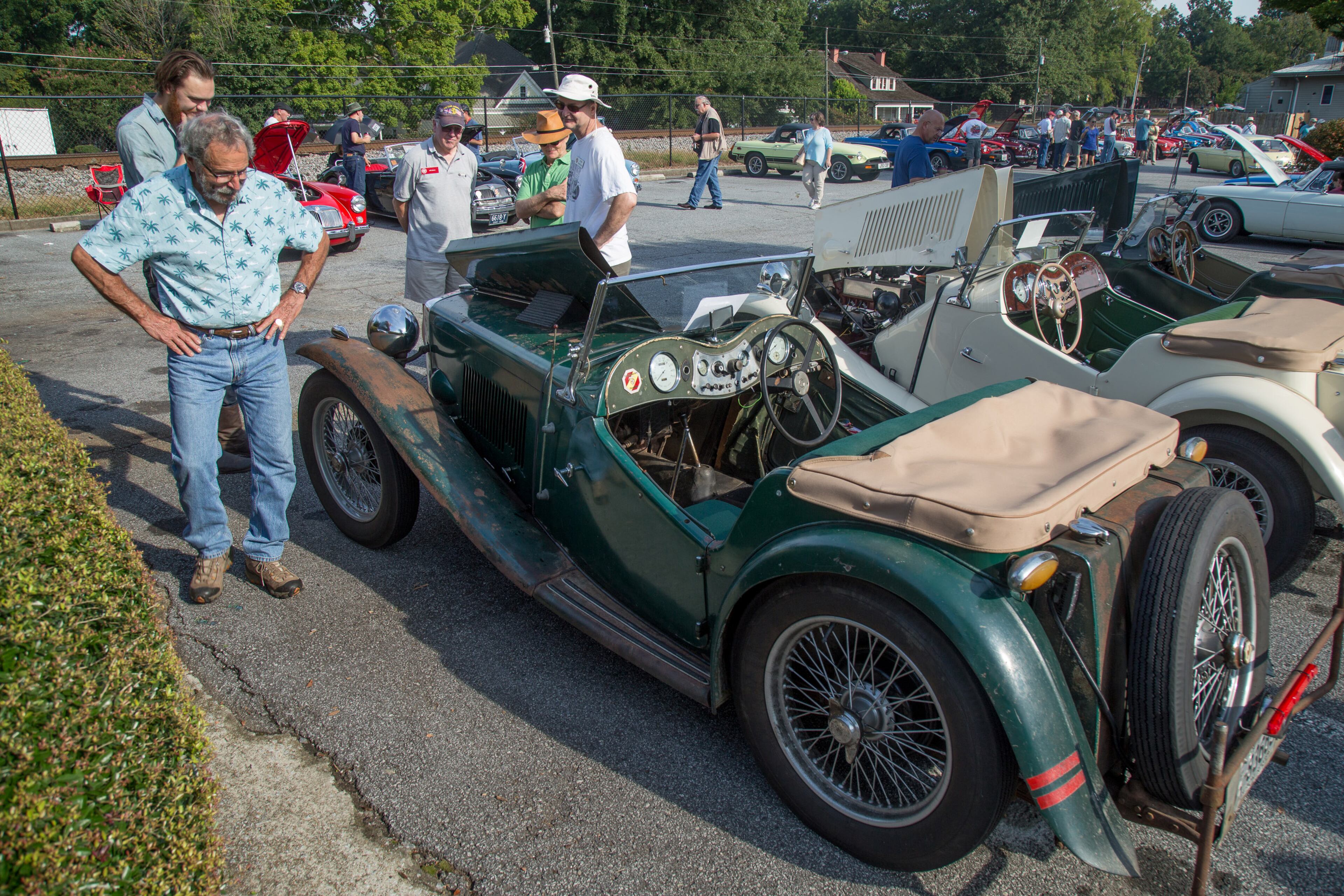 Neil Estes (right) looks over a near stock 1947 MG TC at the 8th annual Atlanta British Car Fayre in downtown Norcross on Saturday, Sept. 8, 2018. The car show featured more than 400 British automobiles and motorcycles. (Photo: STEVE SCHAEFER / SPECIAL TO THE AJC)