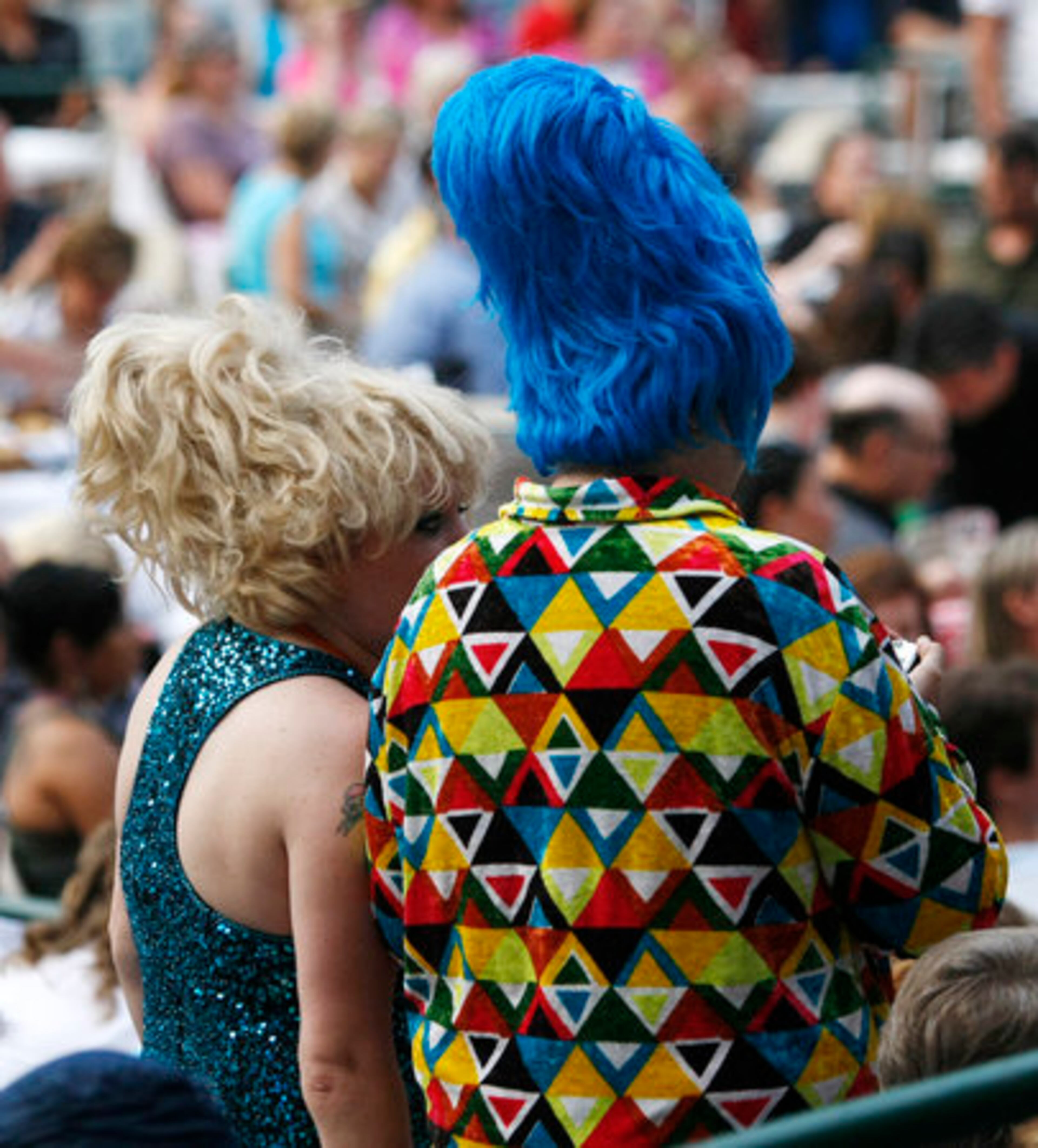 Some obvious B-52 fans take in the sounds of Blondie, which performed first, at the Chastain Park.