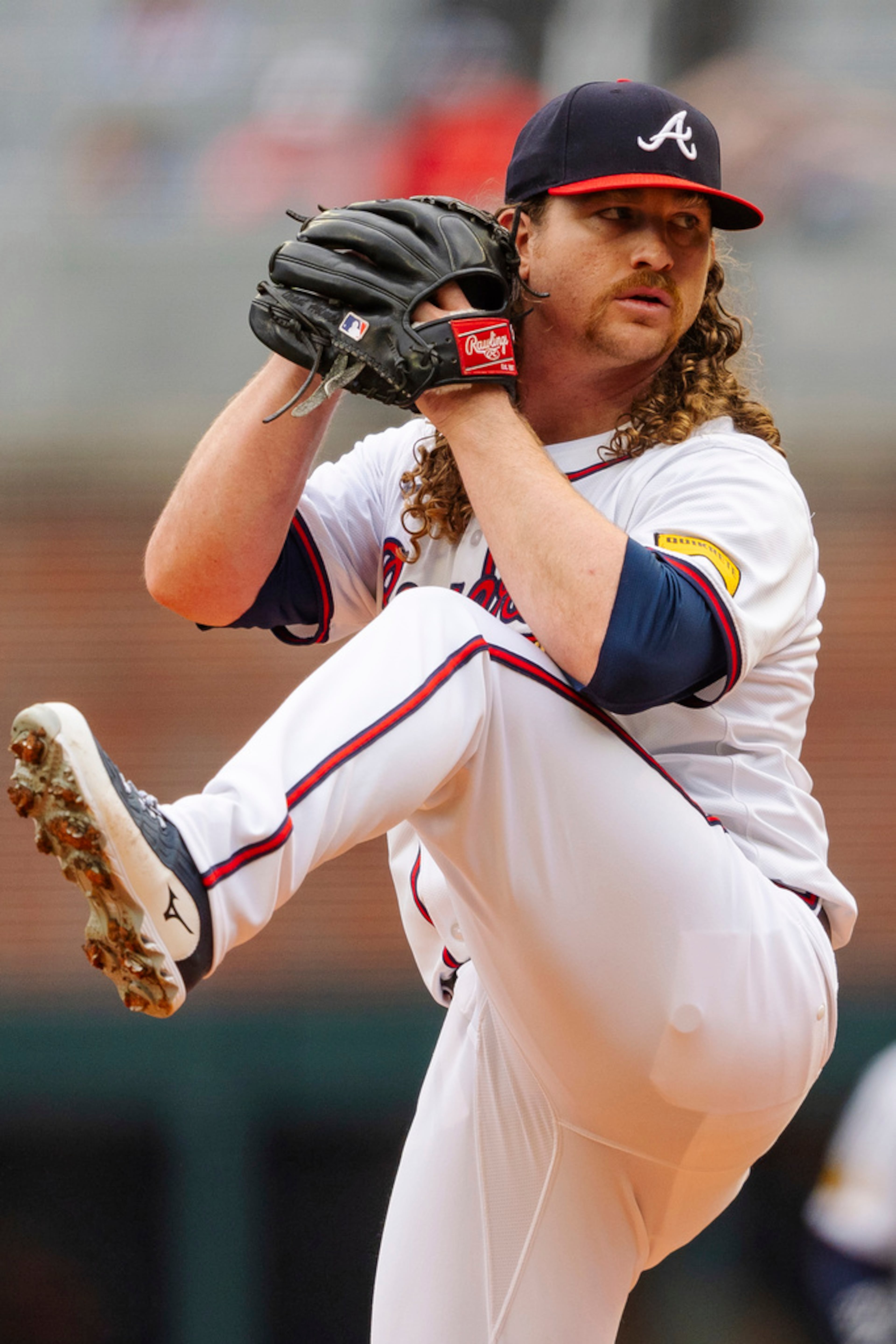 Atlanta Braves pitcher Grant Holmes throws in the second inning of the second baseball game of a doubleheader against the New York Mets, Monday, Sept. 30, 2024, in Atlanta. (AP Photo/Jason Allen)