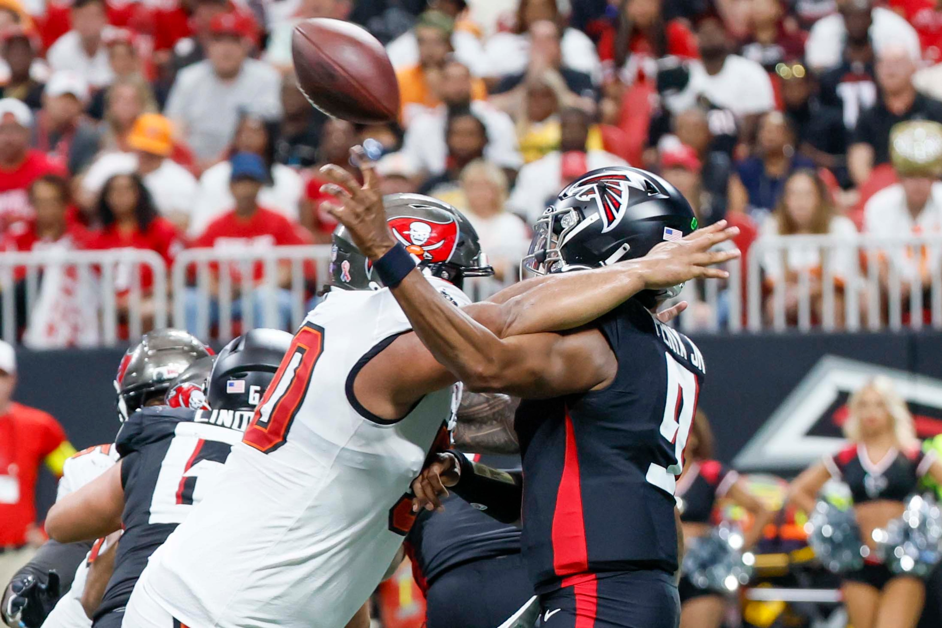 Tampa Bay Buccaneers defensive tackle Vita Vea (50) hits Atlanta Falcons quarterback Michael Penix Jr. (9) for a a penalty during the second half of an NFL football game against the Tampa Bay Buccaneers at Mercedes-Benz Stadium on Sunday, September 7, 2025, in Atlanta.
(Miguel Martinez/ AJC)