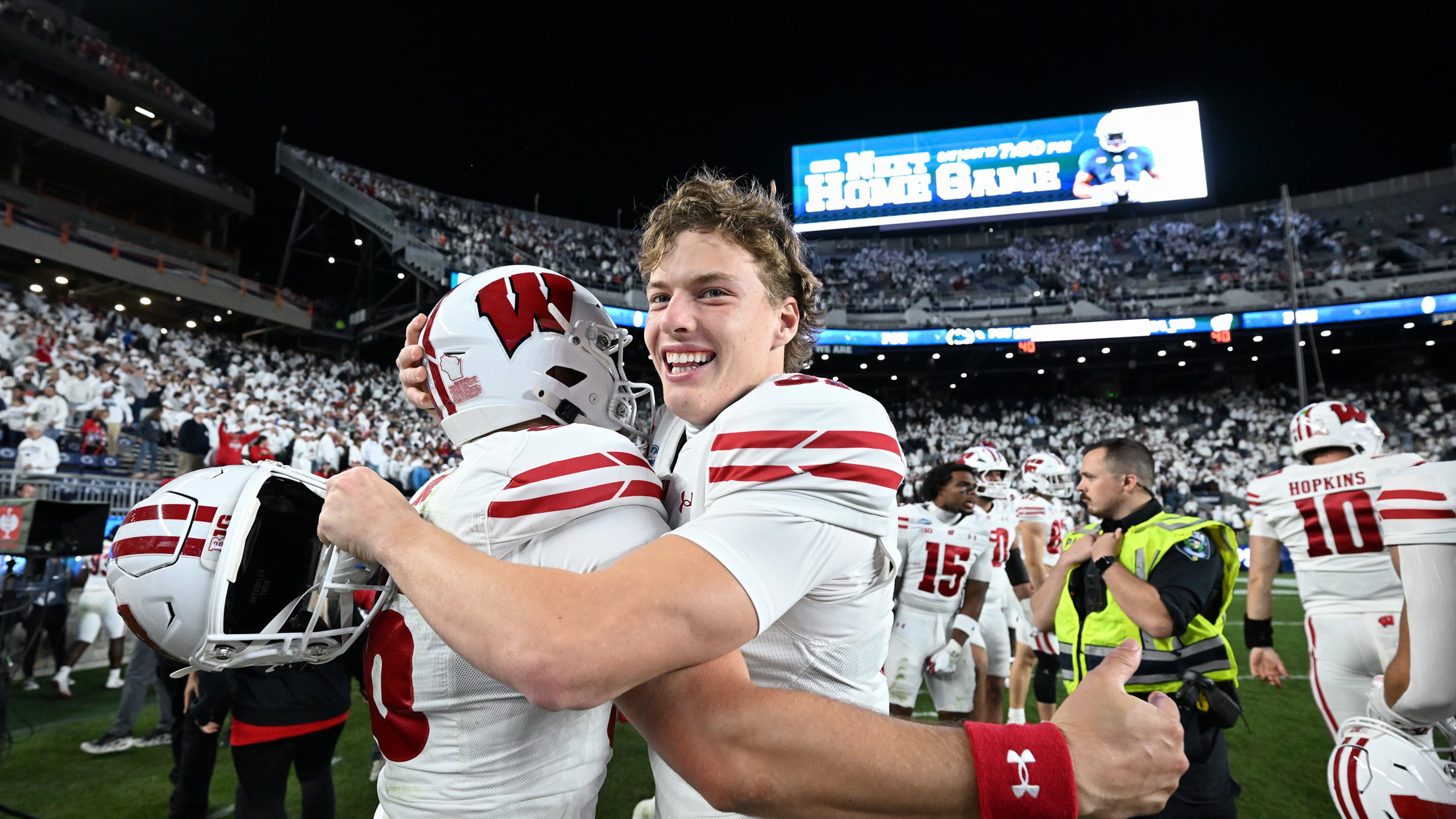Wisconsin's Sean West, right, celebrates with James Roe, left, after their team defeated Penn State in an NCAA college football game, Saturday, Sept. 26, 2026, in State College, Pa. (AP Photo/Barry Reeger)