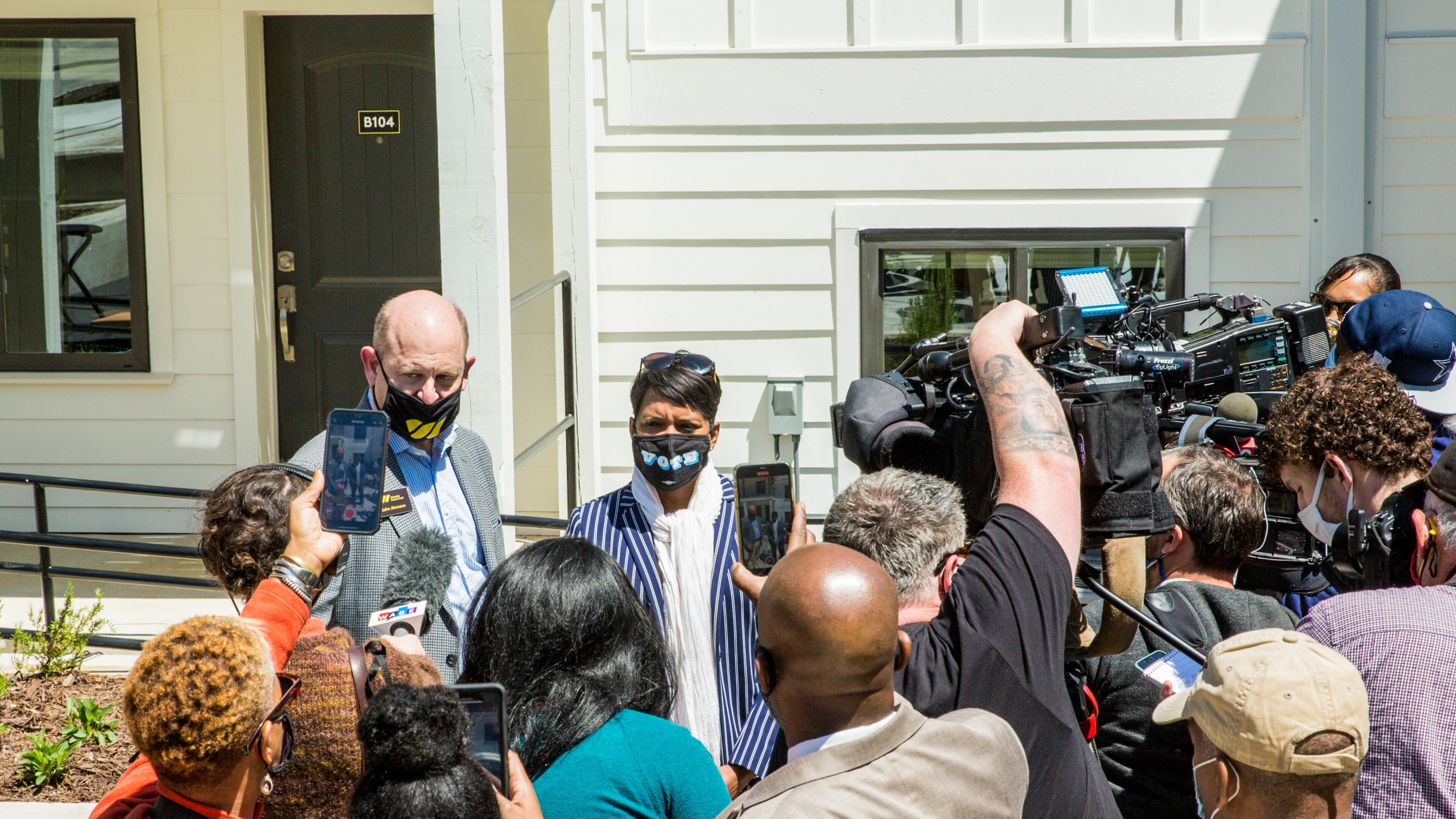 Mayor Keisha Lance Bottoms speaks to reporters after the formal ribbon-cutting at a new affordable housing complex for Westside residents. (Jenni Girtman for The Atlanta Journal-Constitution)
