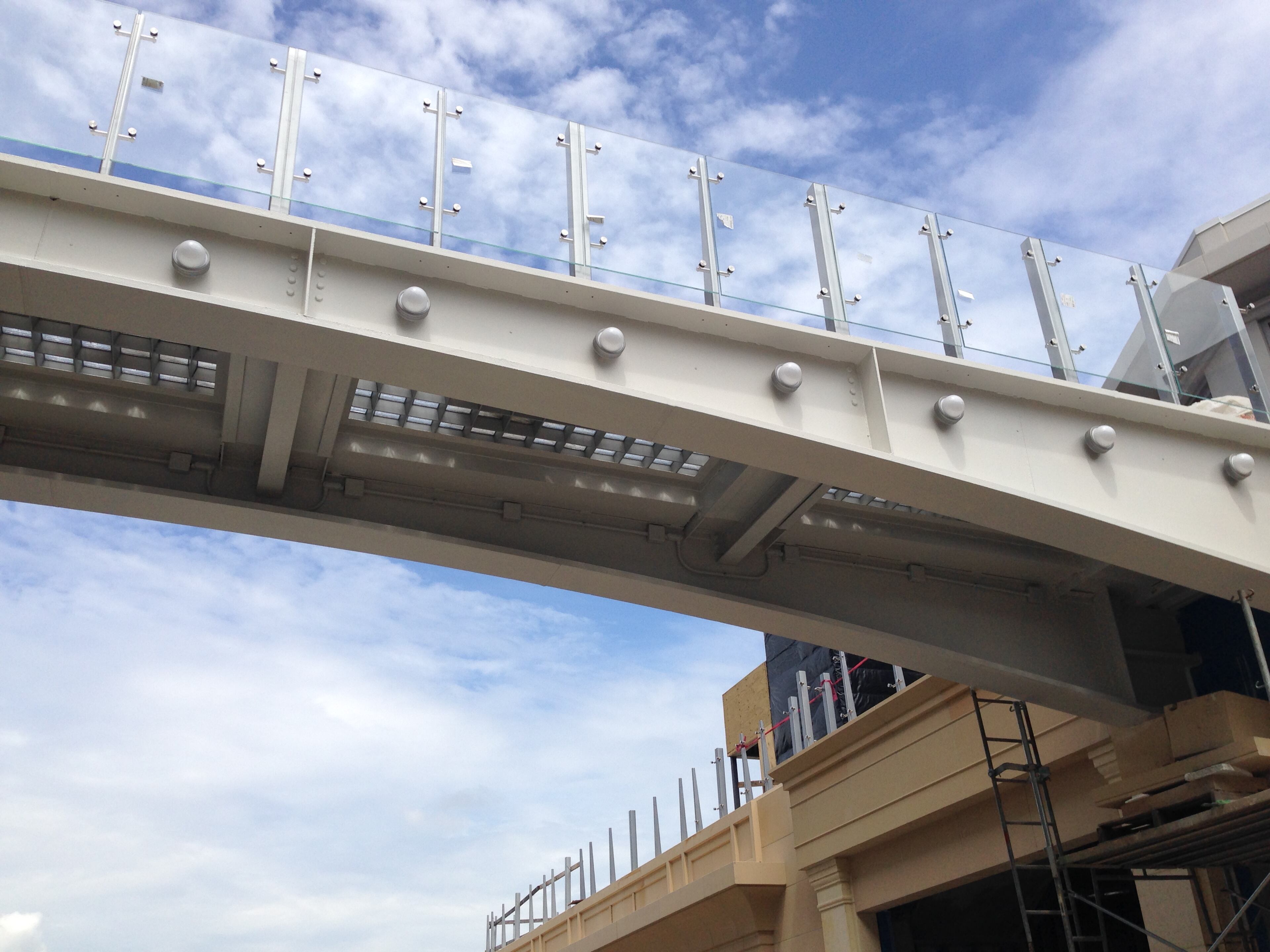 A pedestrian bridge at Buckhead Atlanta, the retail and restaurant destination that is replacing the much of the area's old party district. Work is expected to be finished in time for the project's early September opening.
