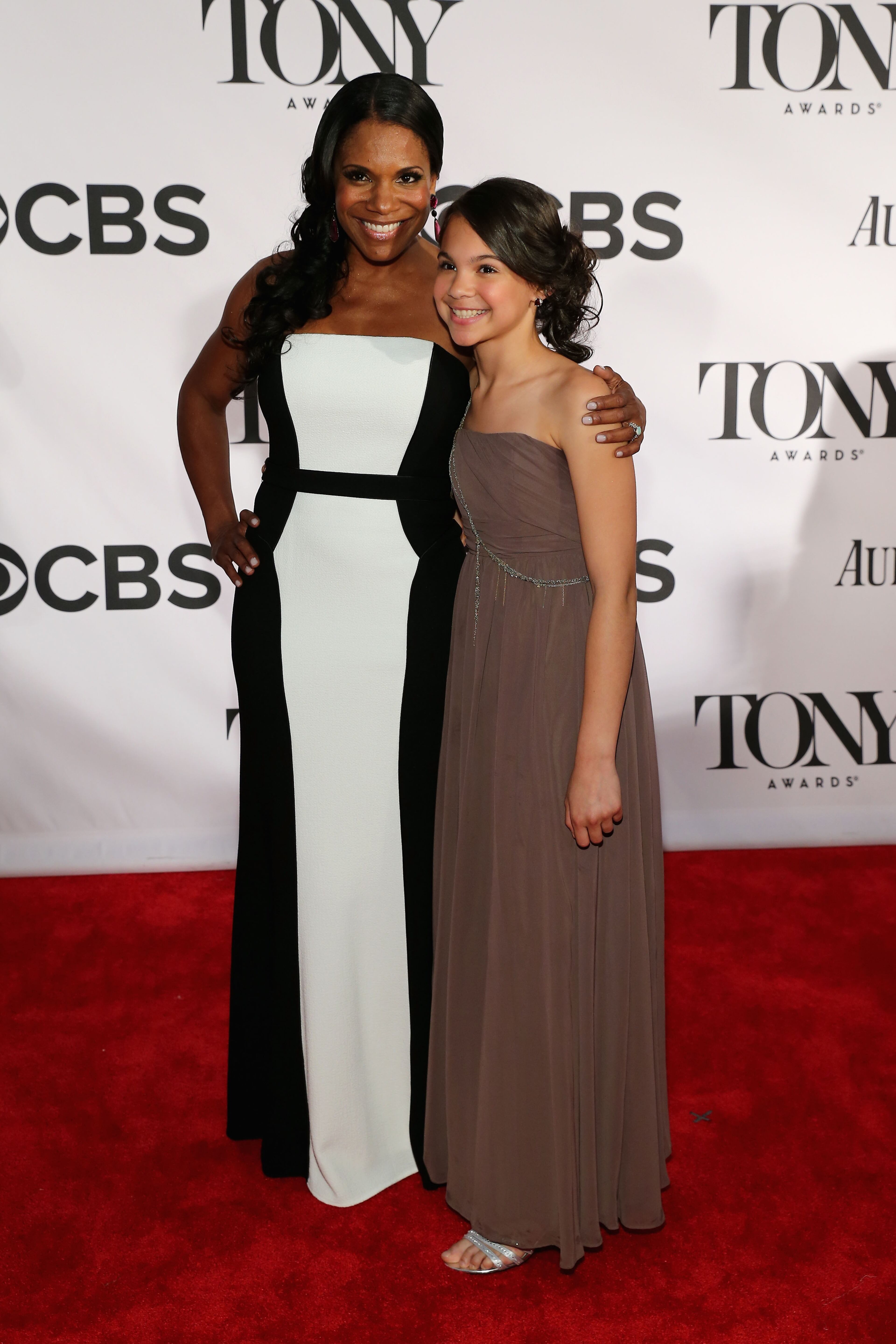 Actress Audra McDonald and daughter Zoe Madeline Donovan attend The 67th Annual Tony Awards at Radio City Music Hall on June 9, 2013 in New York City.