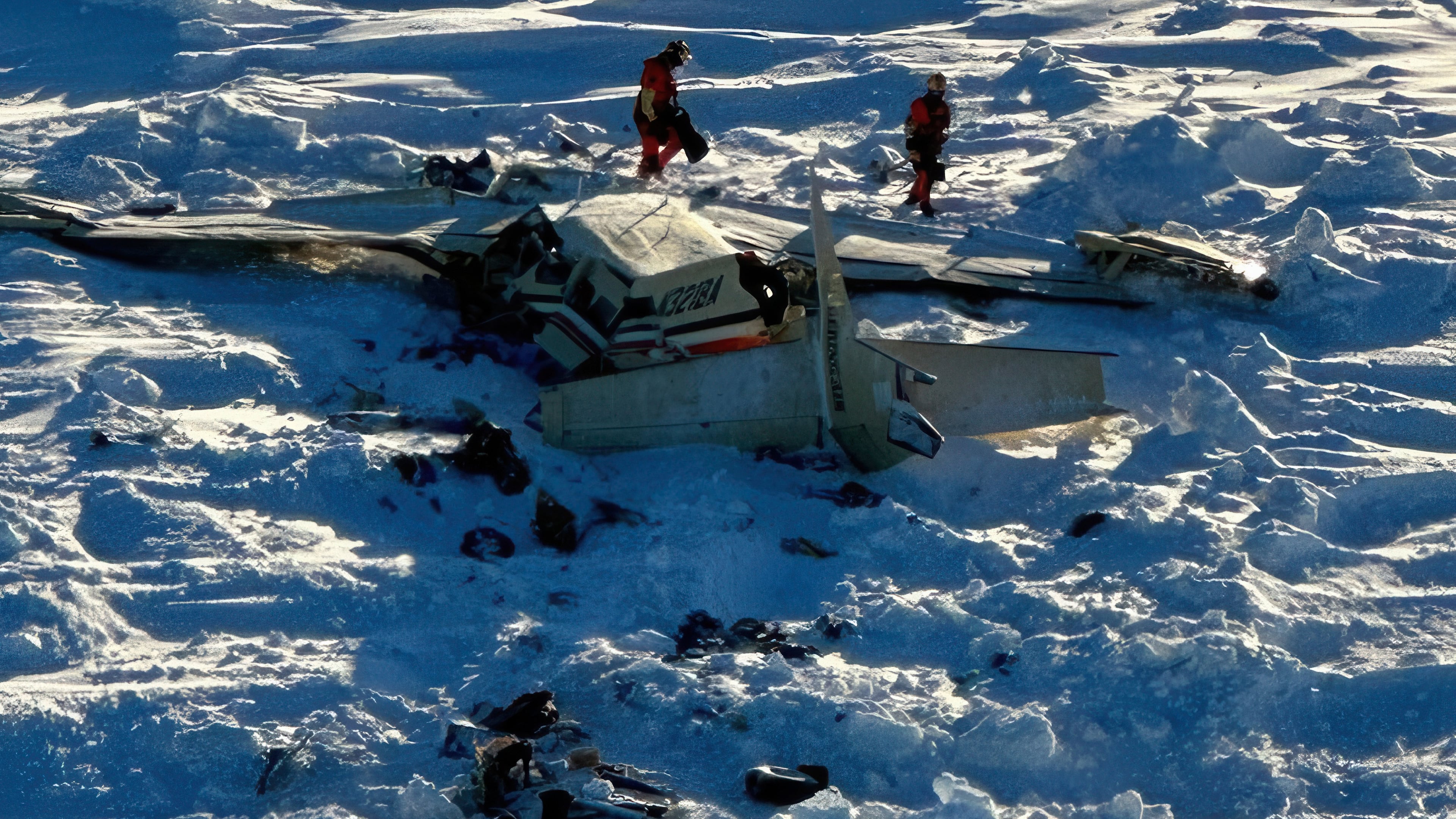 FILE - This photo provided by the U.S. Coast Guard on Feb. 7, 2025, shows a small commuter plane that crashed in western Alaska on a flight that was bound for the hub community of Nome. (U.S. Coast Guard via AP, File)