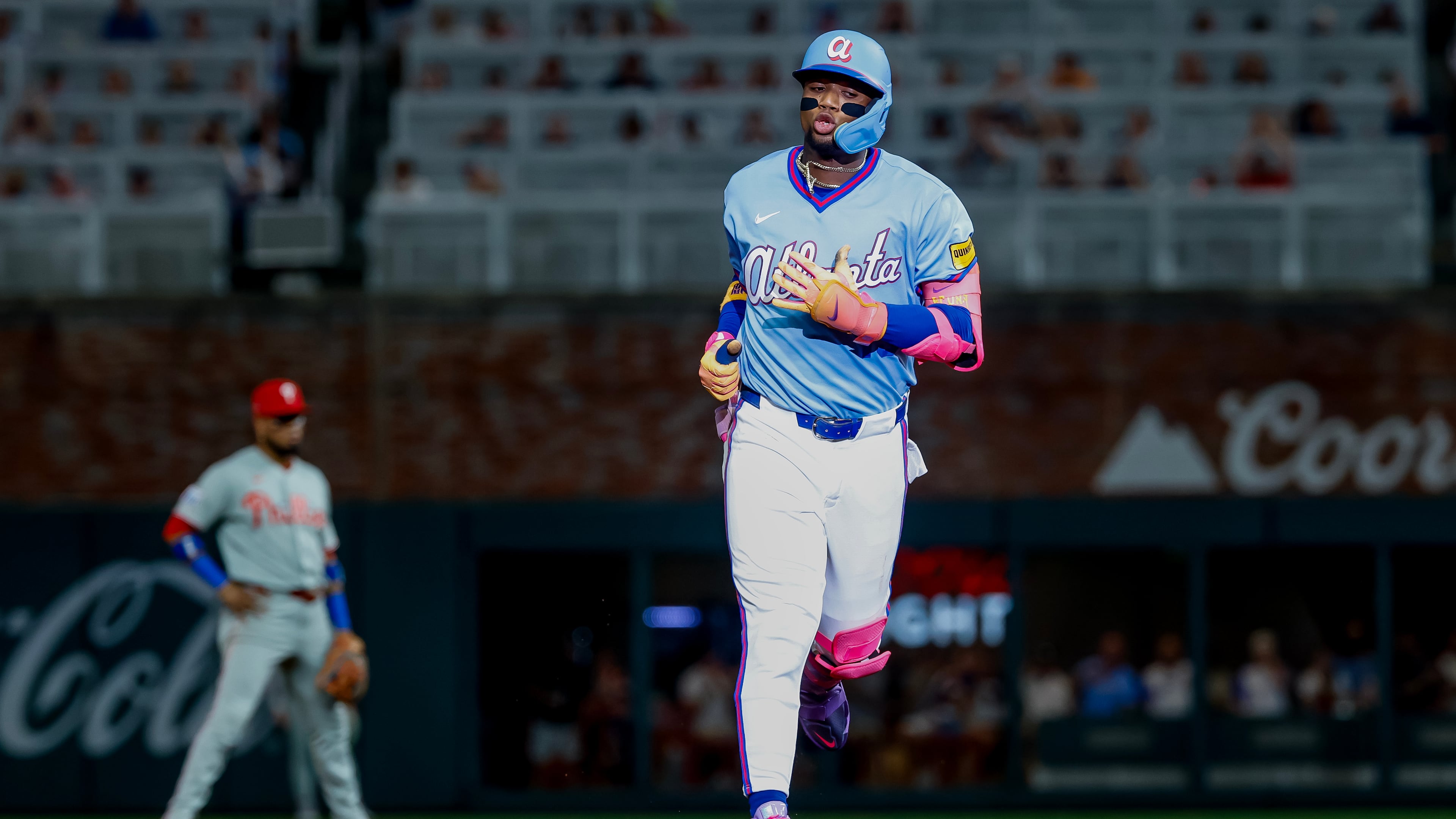 Atlanta Braves' Ronald Acuña Jr. rounds the bases after hitting a solo home run against the Philadelphia Phillies during the fourth inning of a baseball game, Saturday, Sept. 12, 2026, in Atlanta. (AP Photo/Erik S. Lesser)