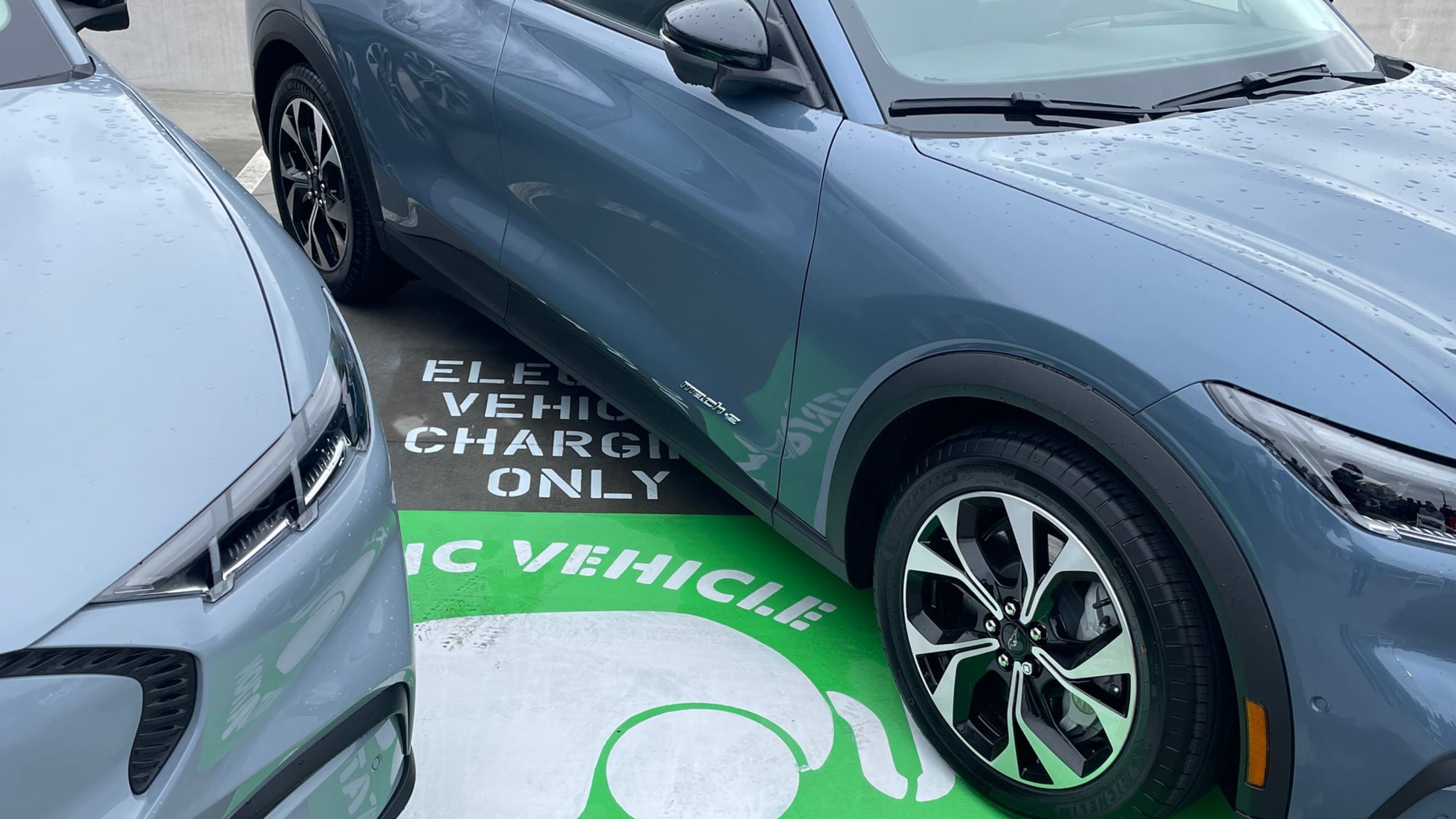 Atlanta Mayor Andre Dickens and sustainable energy leaders celebrated 21 new electric vehicle chargers at the parking garage that caters to City Hall employees on Feb. 19, 2025. (Riley Bunch/AJC)
