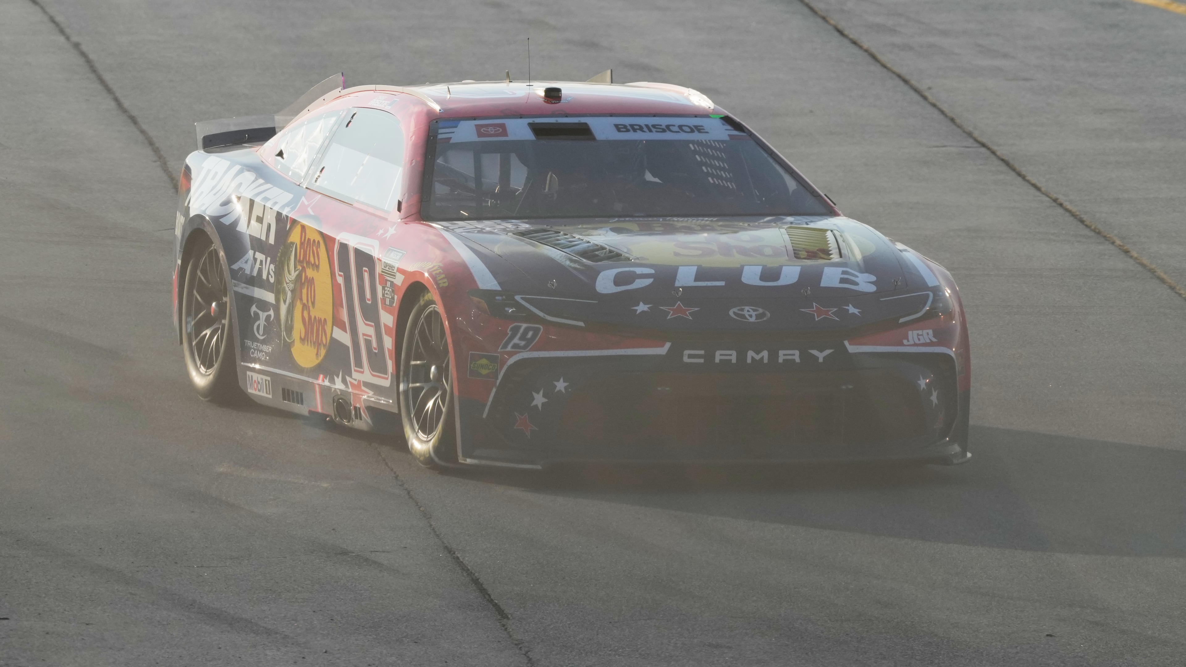 Chase Briscoe (19) drives to the track after making a pit stop during a NASCAR Cup Series auto race at Chicagoland Speedway in Joliet, Ill., Sunday, July 5, 2026. (AP Photo/Nam Y. Huh)