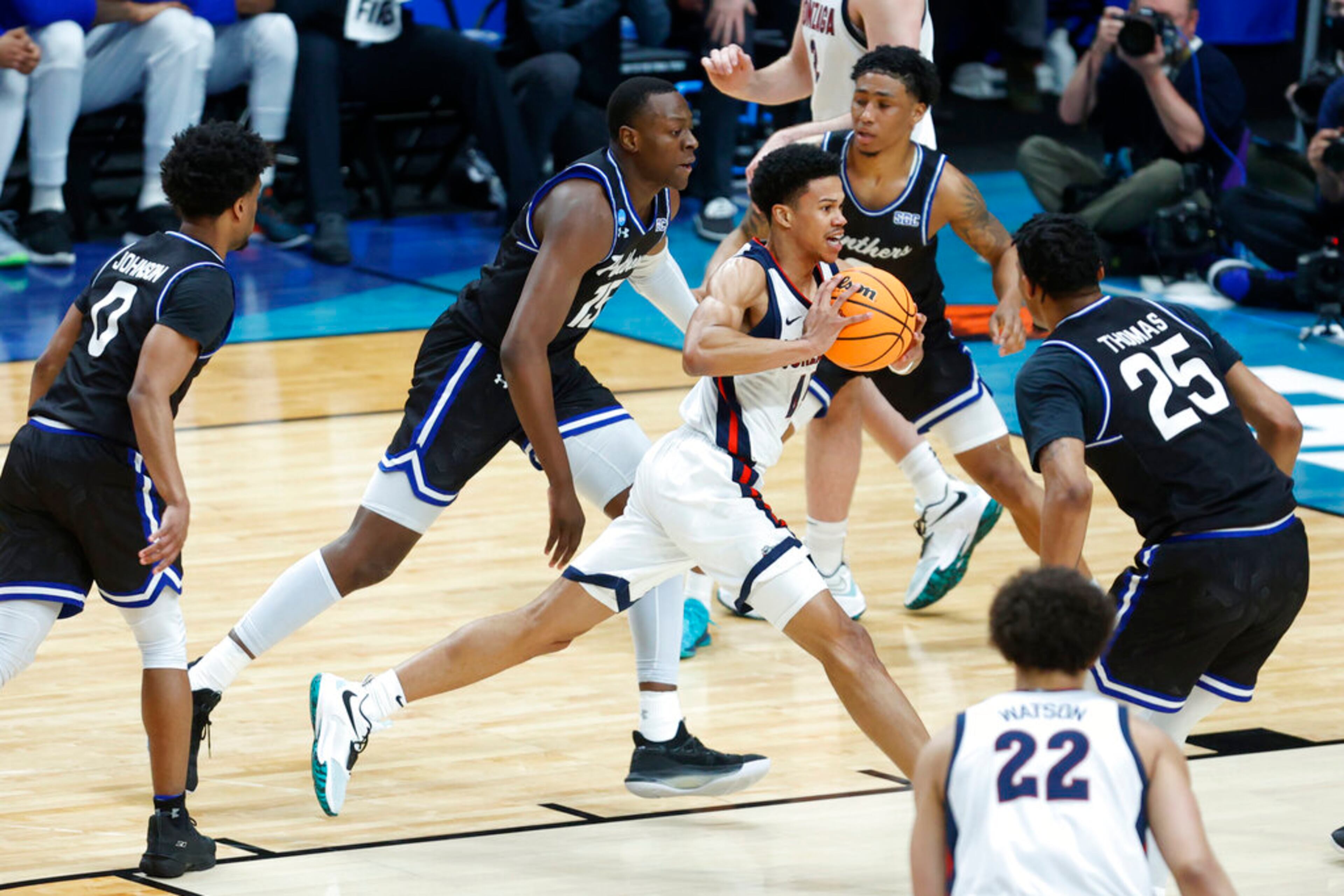 Gonzaga guard Rasir Bolton, center, drives with the ball against Georgia State during the first half of a first round NCAA college basketball tournament game, Thursday, March 17, 2022, in Portland, Ore. (AP Photo/Craig Mitchelldyer)