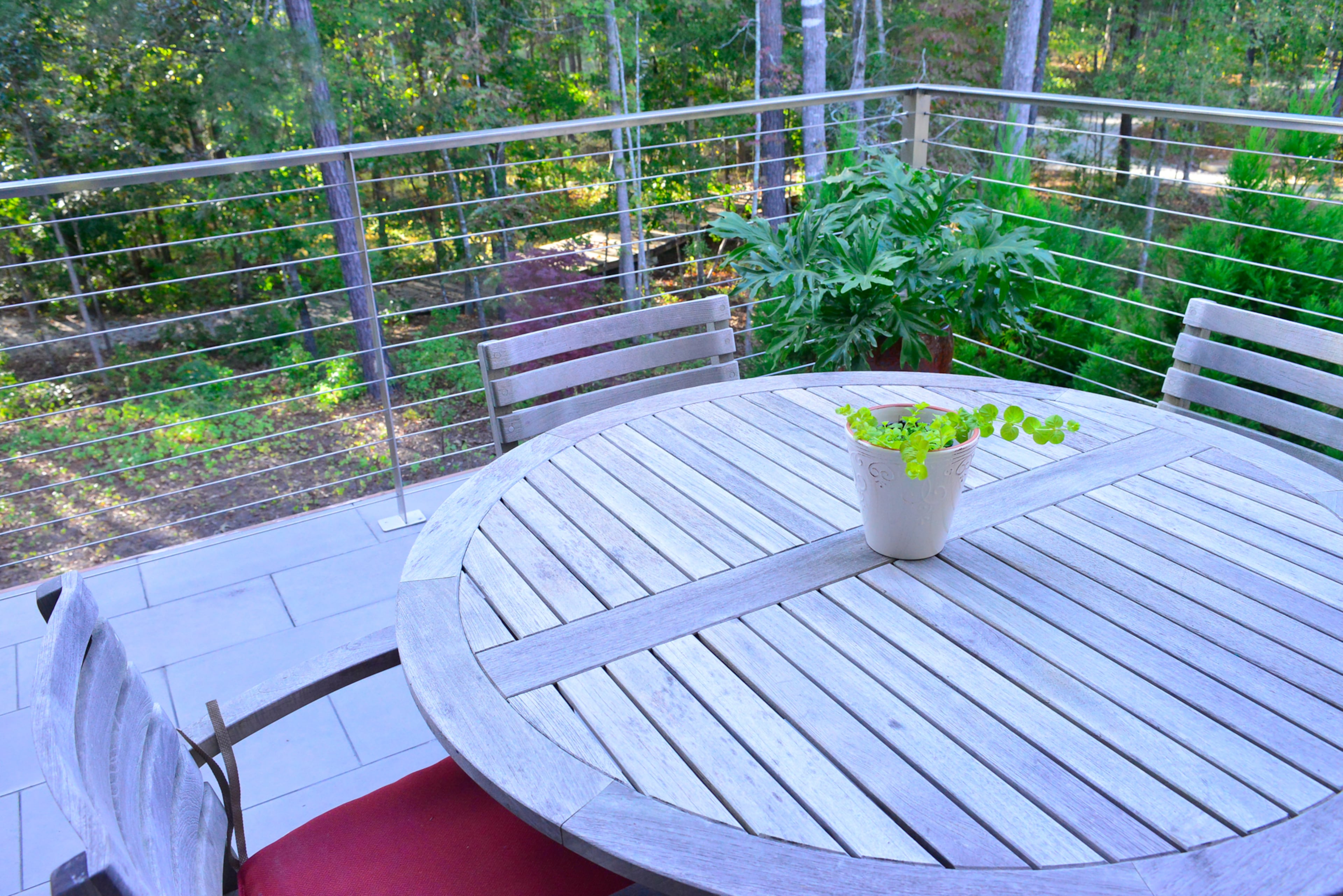 The homeowners' favorite outdoor features include the main patio, roof garden and entry fountain. Landscaping is by Atlanta-based New Moon Gardens.