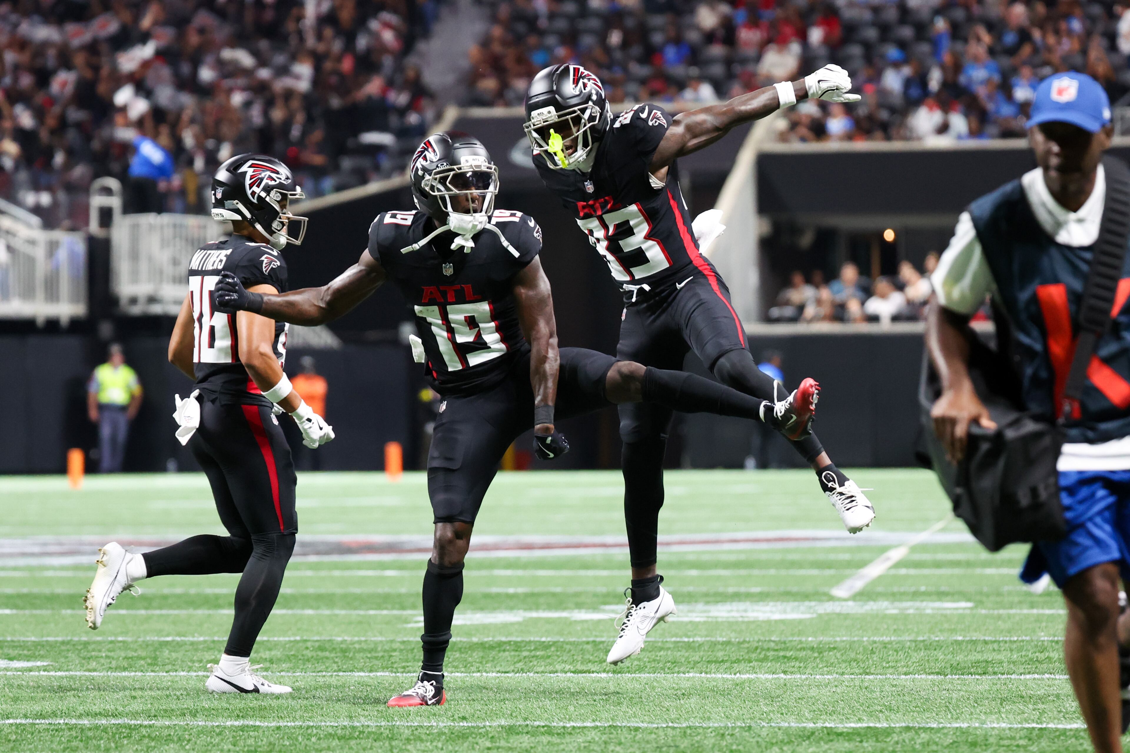 Atlanta Falcons wide receiver Chris Blair (19) and wide receiver Quincy Skinner, Jr. (83) celebrate after a touchdown during the first half of an NFL preseason game against the Detroit Lions at Mercedes-Benz Stadium in Atlanta on Friday, August 8, 2025. (Arvin Temkar / AJC)