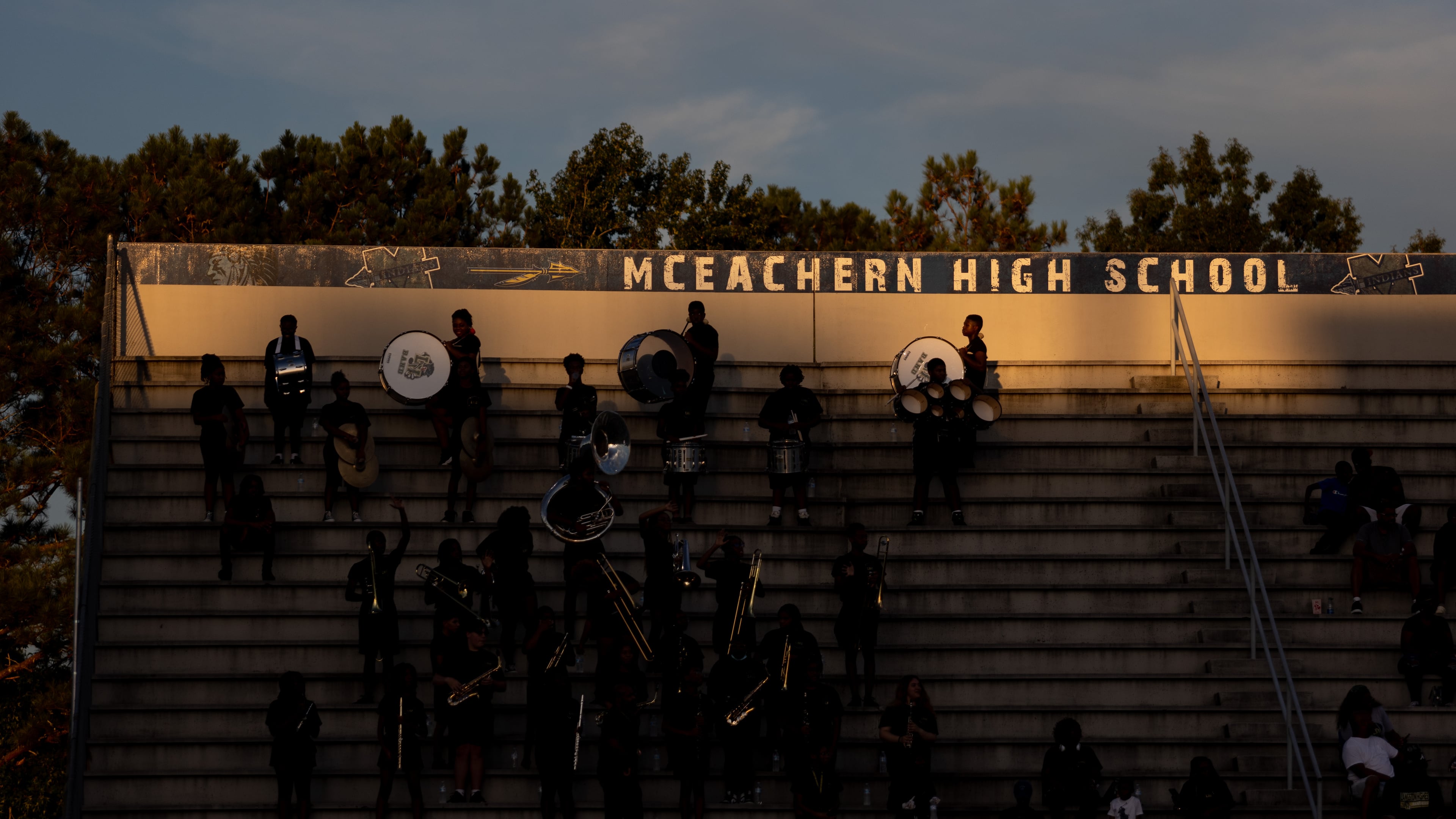 Fans are seen under the McEachern High School sign during a GHSA High School football game between Langston Hughes High School and McEachern High School at McEachern High School in Powder Springs, Georgia, on Friday, Aug. 26, 2022. (Courtesy of Jenn Finch)