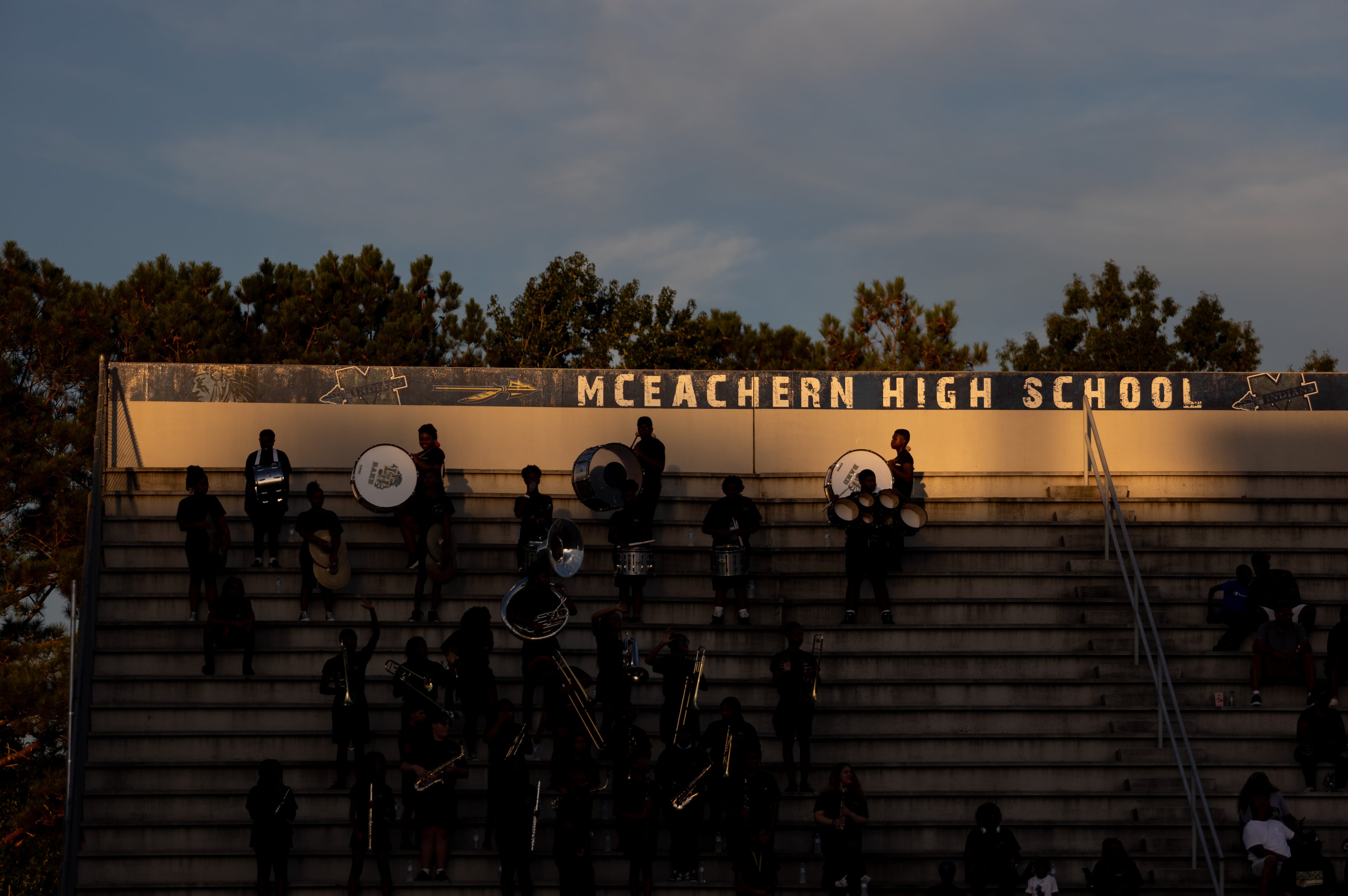 Fans are seen under the McEachern High School sign during a GHSA High School football game between Langston Hughes High School and McEachern High School at McEachern High School in Powder Springs, Georgia, on Friday, Aug. 26, 2022. (Courtesy of Jenn Finch)