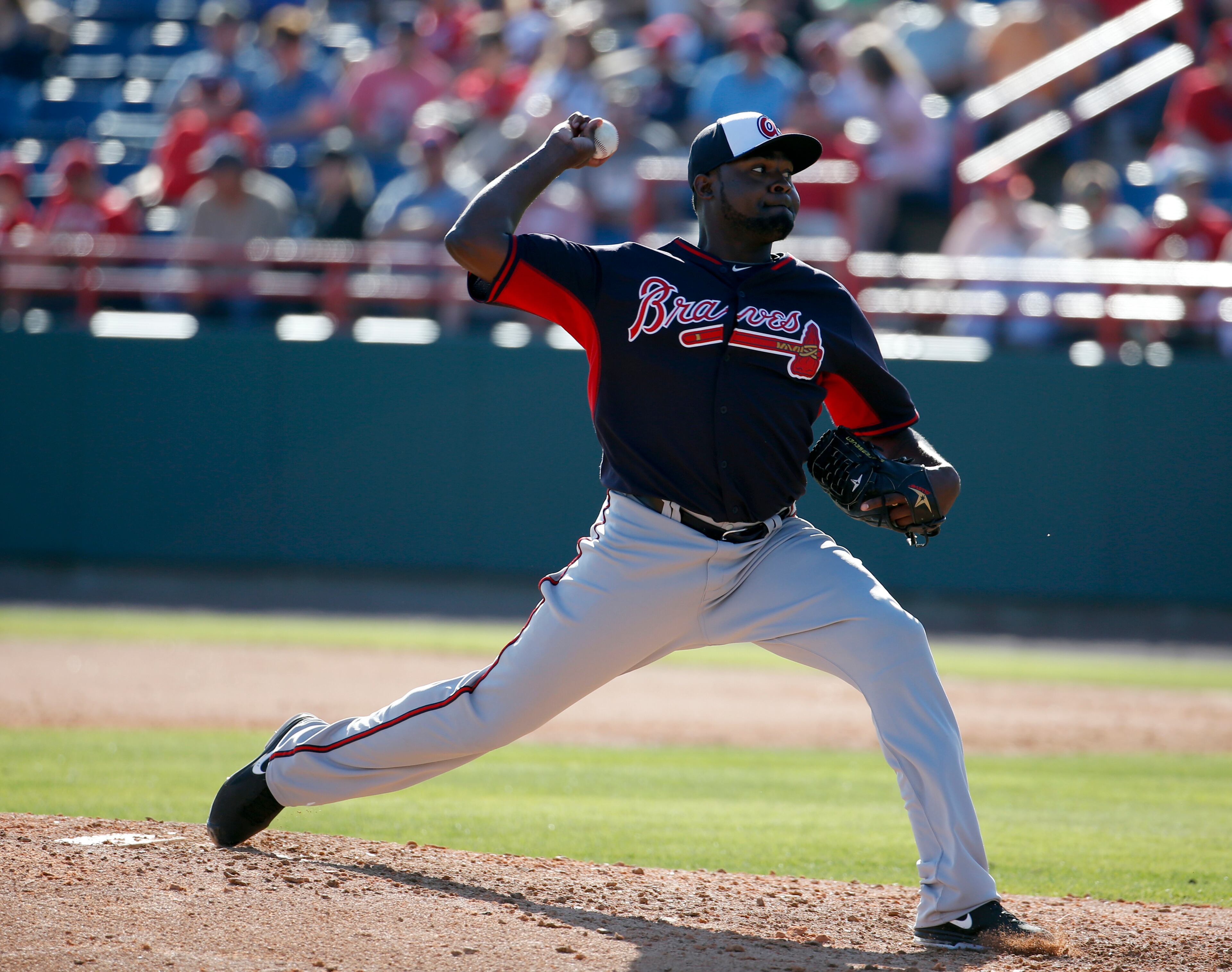 Atlanta Braves relief pitcher Wirfin Obispo (62) throws in a spring exhibition baseball game against the Washington Nationals, Saturday, March 1, 2014, in Viera, Fla. The Nationals won 16-15. (AP Photo/Alex Brandon)