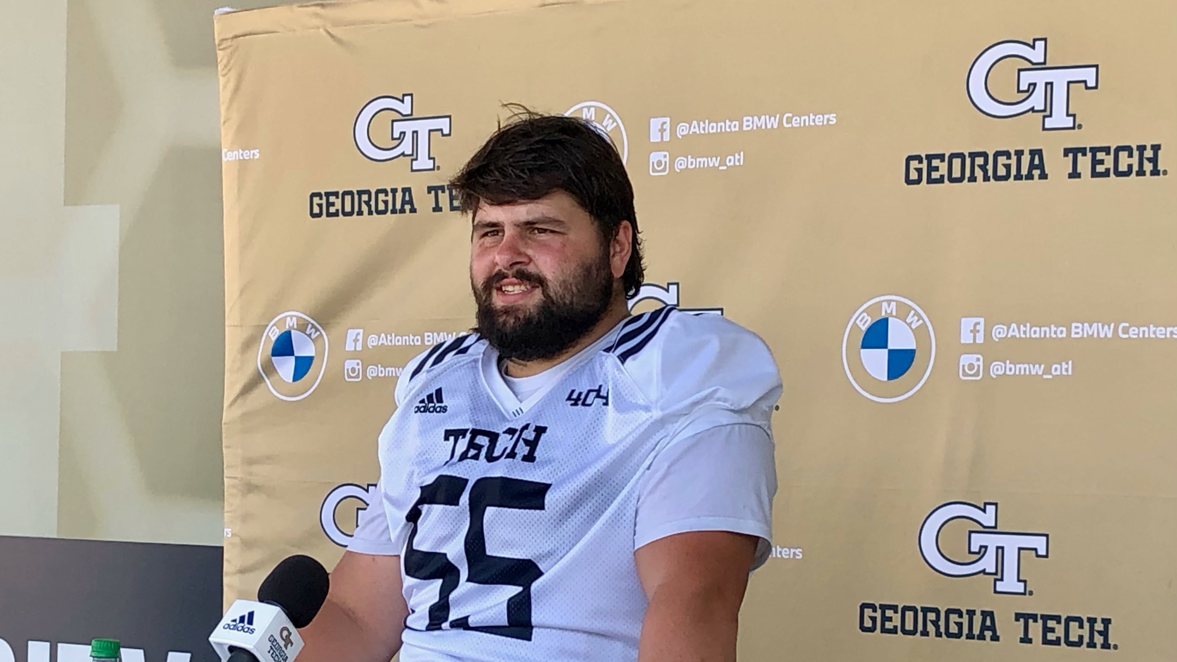 Georgia Tech offensive lineman Kenny Cooper speaks with media after a preseason practice August 13, 2021 at Bobby Dodd Stadium. (AJC photo by Ken Sugiura)