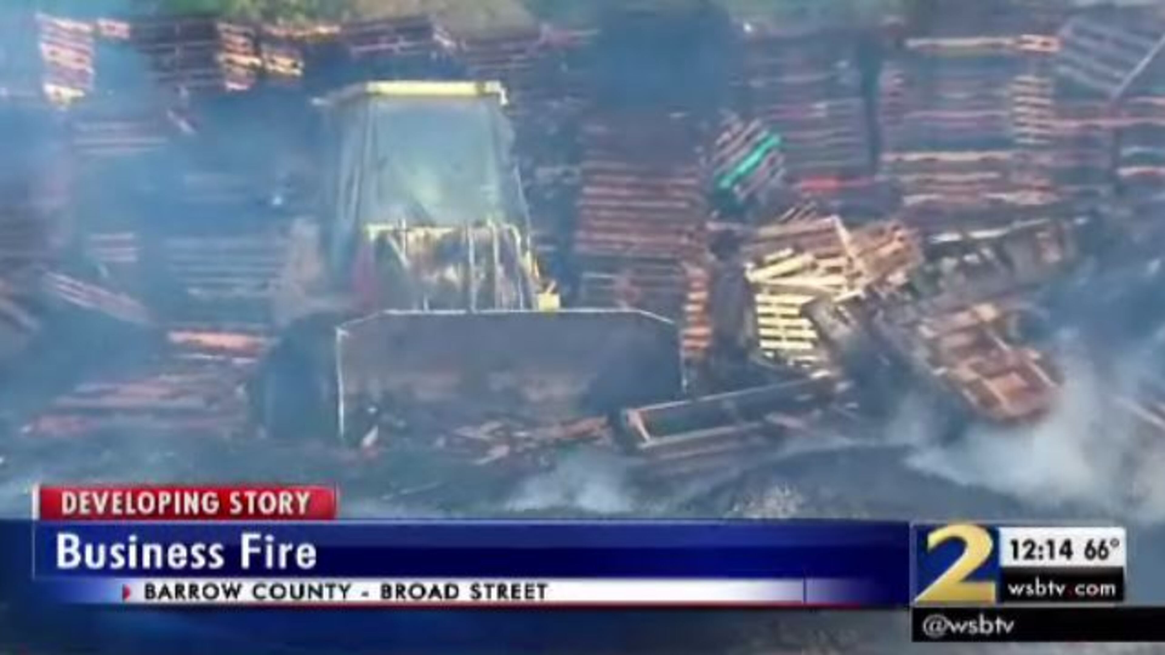 A fire at a pallets business in Barrow County closed a key roadway for part of Wednesday morning. (Credit: Channel 2 Action News)