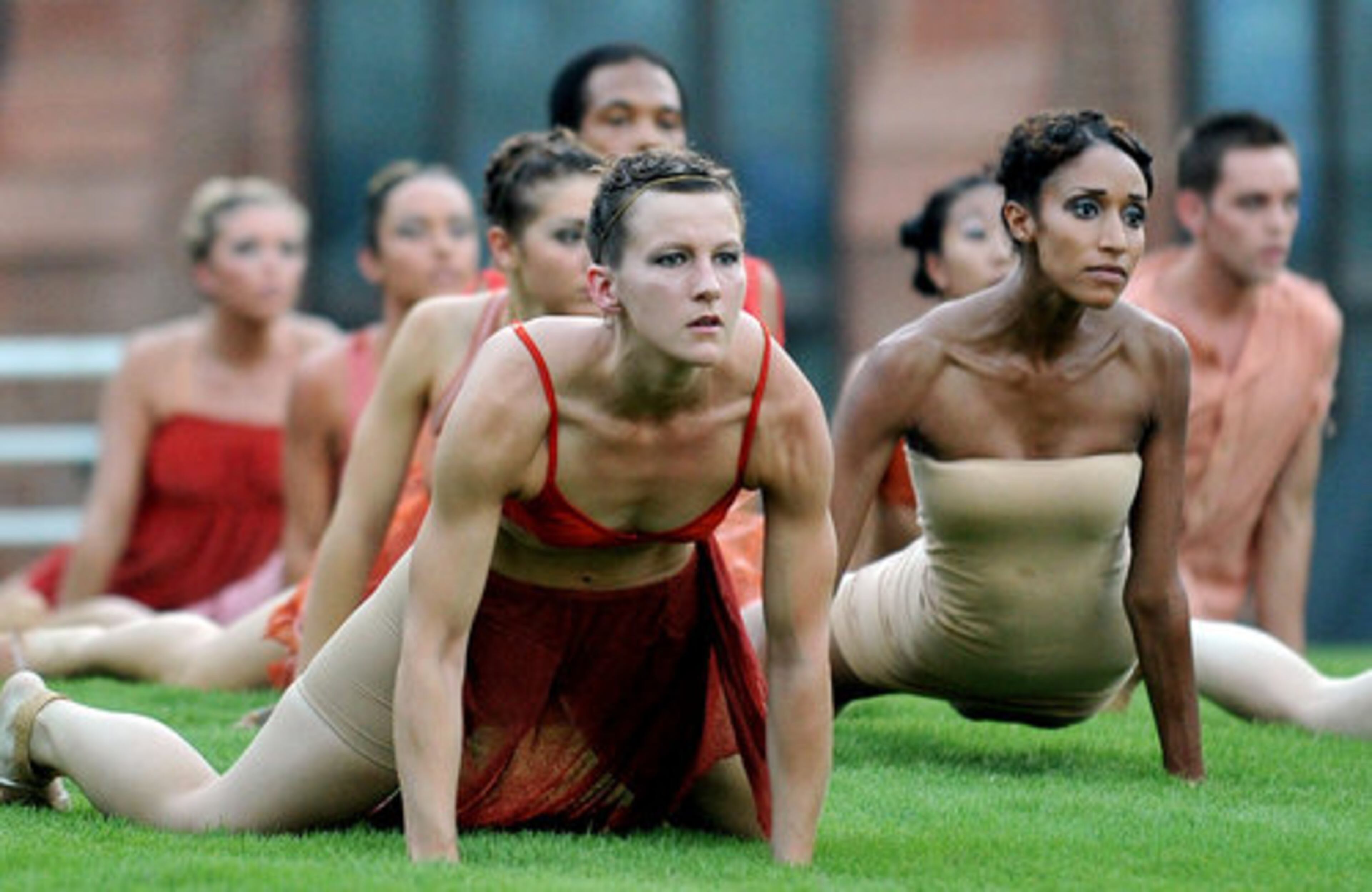 Artists perform "Blades of Grass" during Roem, gloATL dance troupe's latest site-specific event, Saturday at outdoors on the Woodruff Arts Center in Atlanta. Saturday, July 24, 2010.
