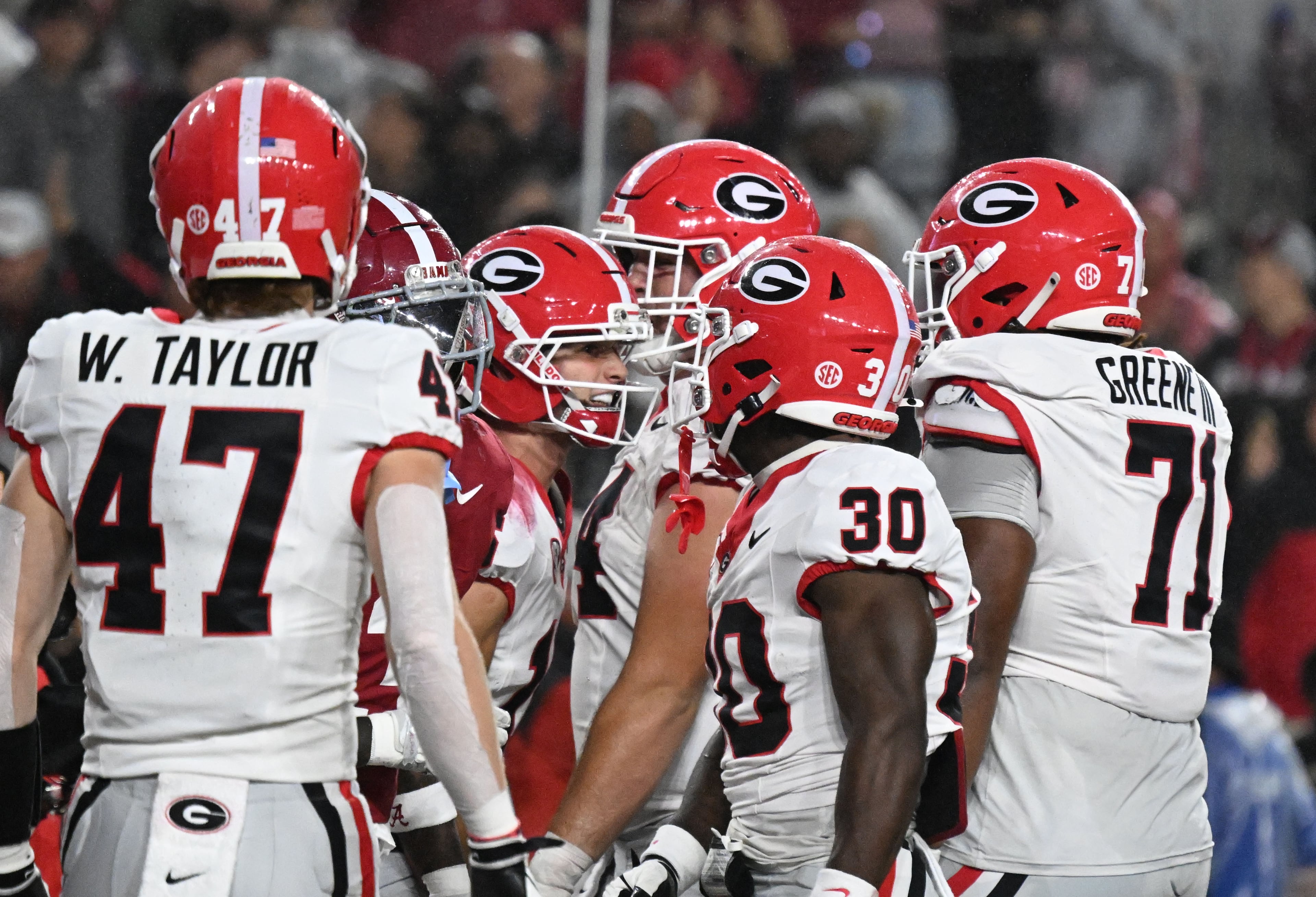 Georgia wide receiver London Humphreys celebrates with teammates after scoring a touchdown during the first half in an NCAA football game at Bryant-Denny Stadium on Saturday, Oct. 10, 2026, in Tuscaloosa, Alabama. (Hyosub Shin/AJC)