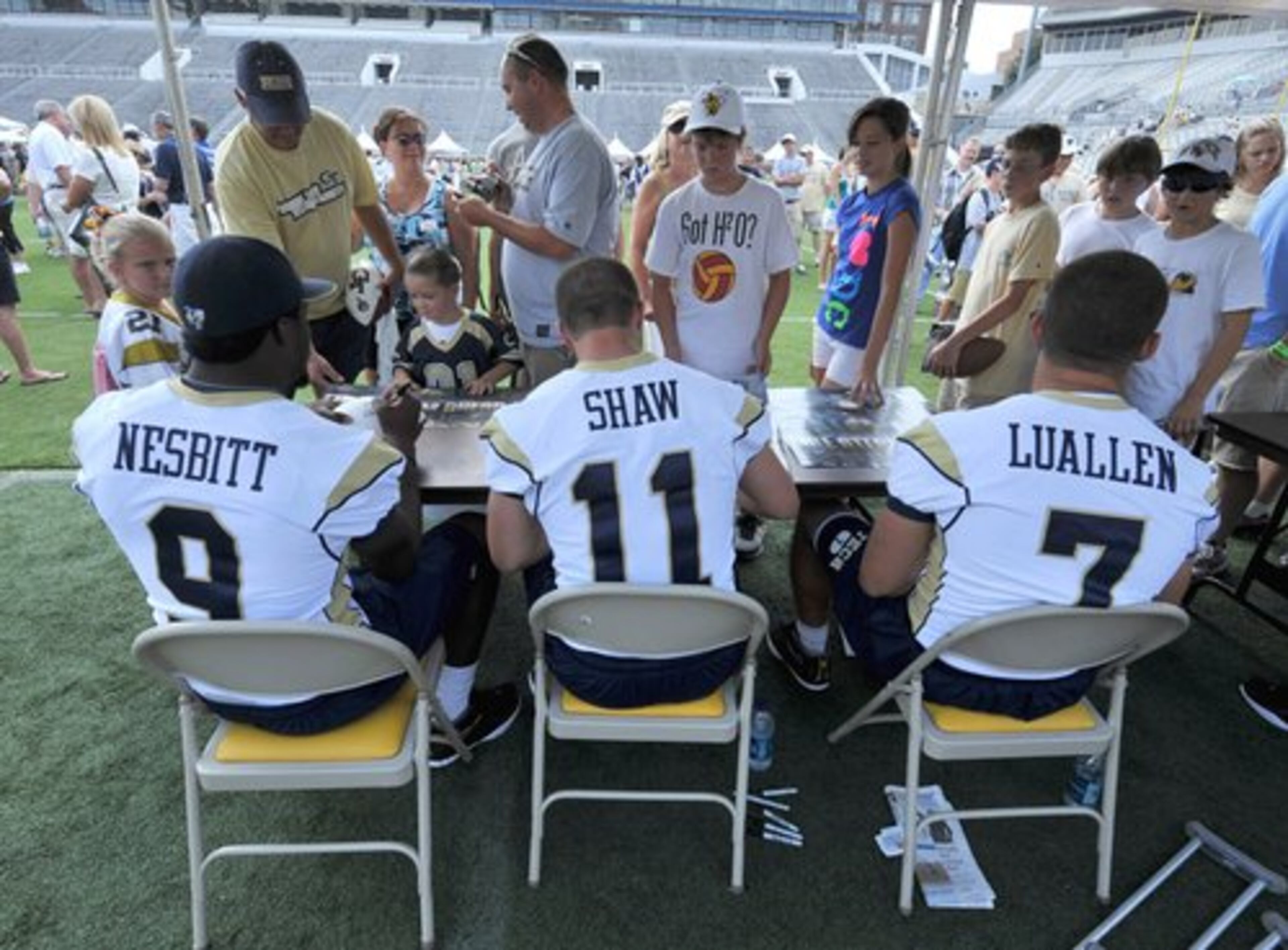 Fans lined up to received the autographs and photos with Tech quarterbacks Josh Nesbitt, Jaybo Shaw and Jordan Luallen.