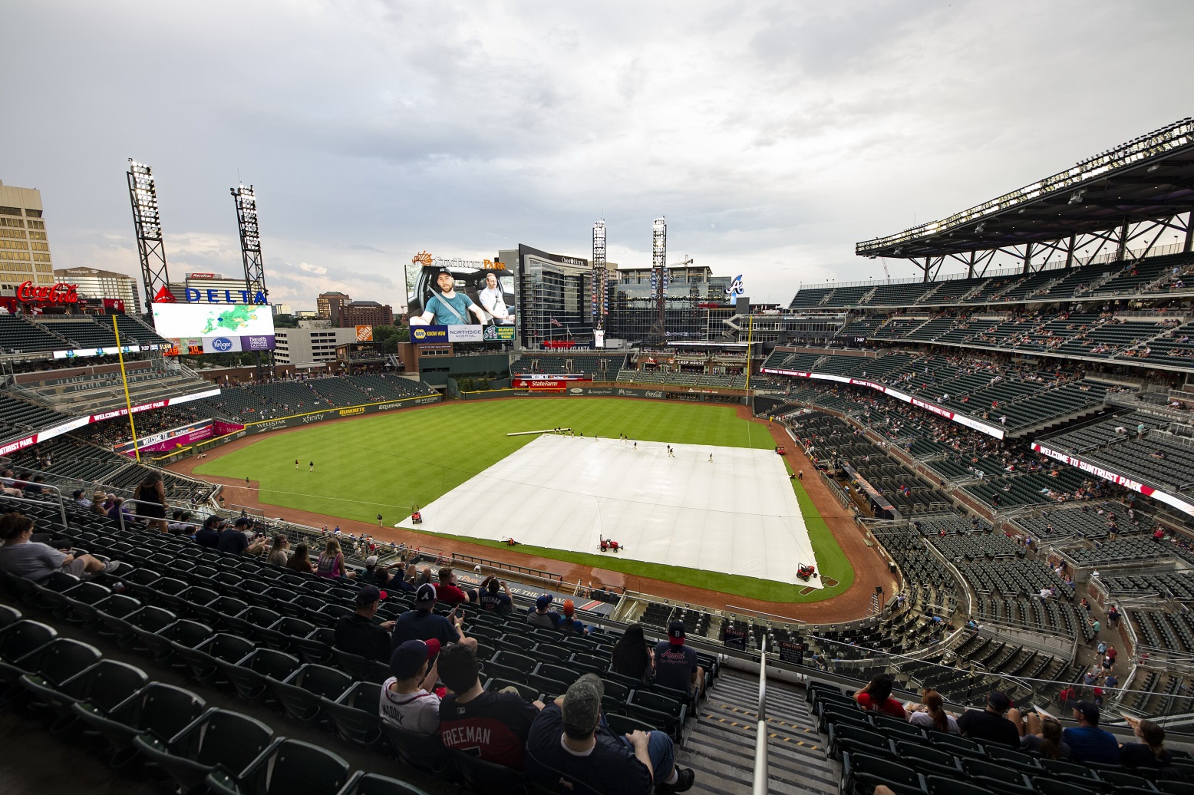 The tarp covers the field during a rain delay between the Atlanta Braves and New York Mets at SunTrust Park on August 14, 2019 in Atlanta, Georgia. (Photo by Carmen Mandato/Getty Images)
