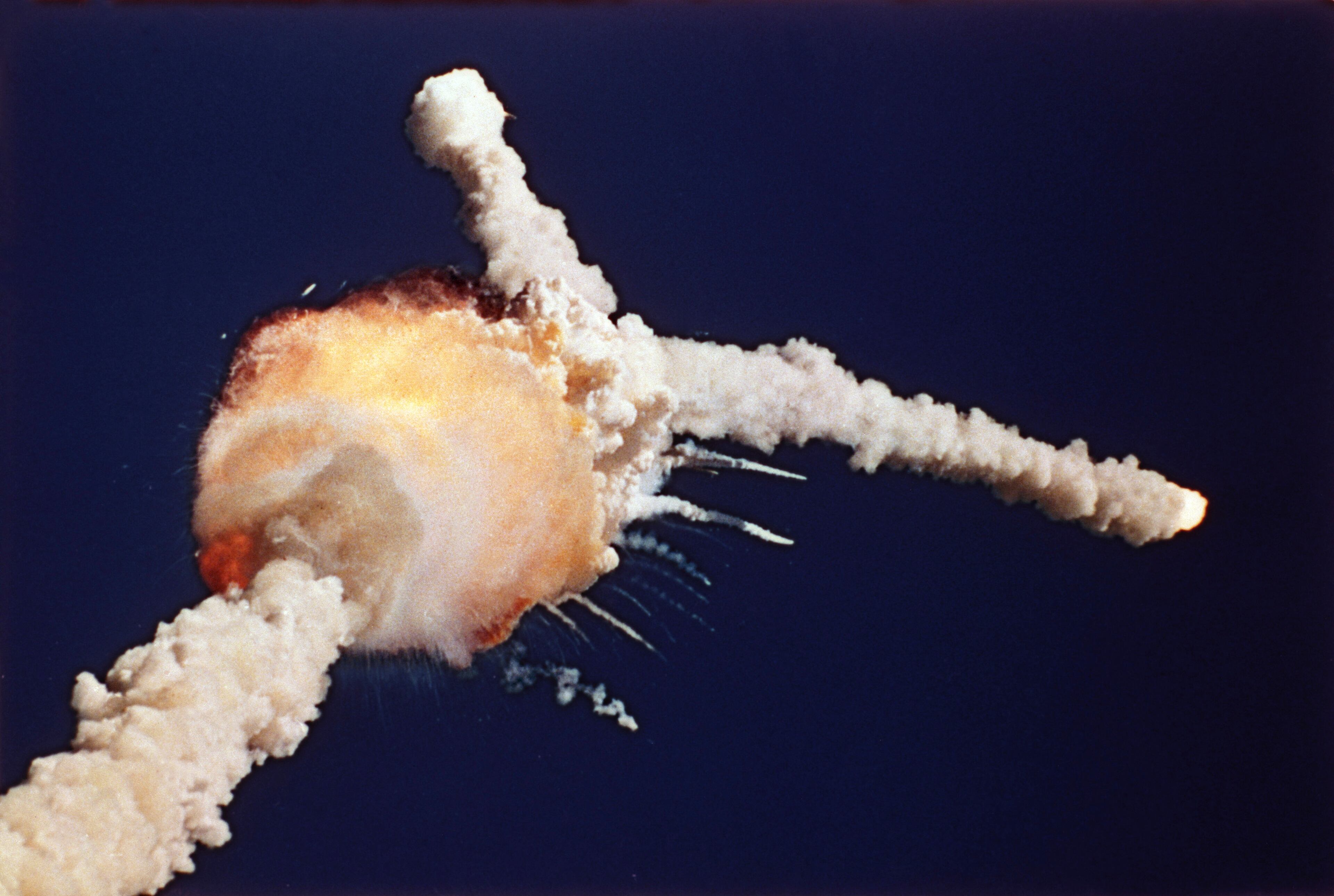 In this Jan. 28, 1986, file photo, the space shuttle Challenger explodes shortly after lifting off from the Kennedy Space Center in Cape Canaveral, Fla.