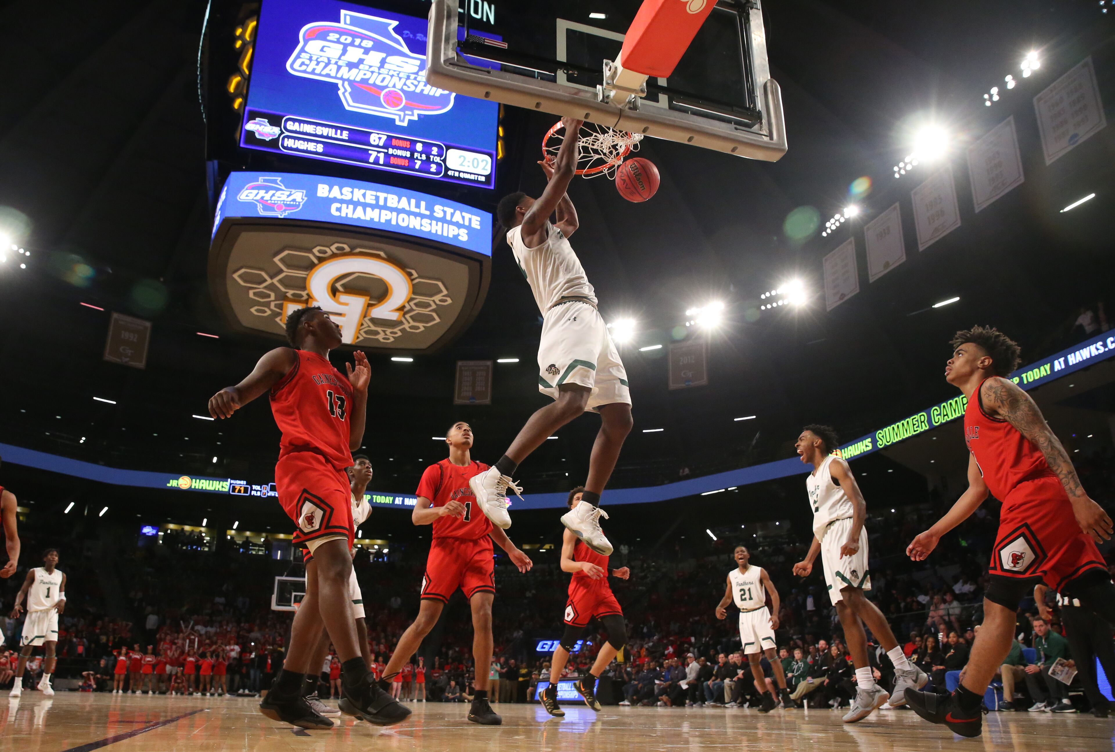 March 9, 2018 - Atlanta, Ga: Hughes forward Tyler Smith (5) dunks during the second half against Gainesville in the GHSA Class AAAAAA Boys State Championship at McCamish Pavilion Friday, March 9, 2018, in Atlanta. Hughes won 85-78. PHOTO / JASON GETZ