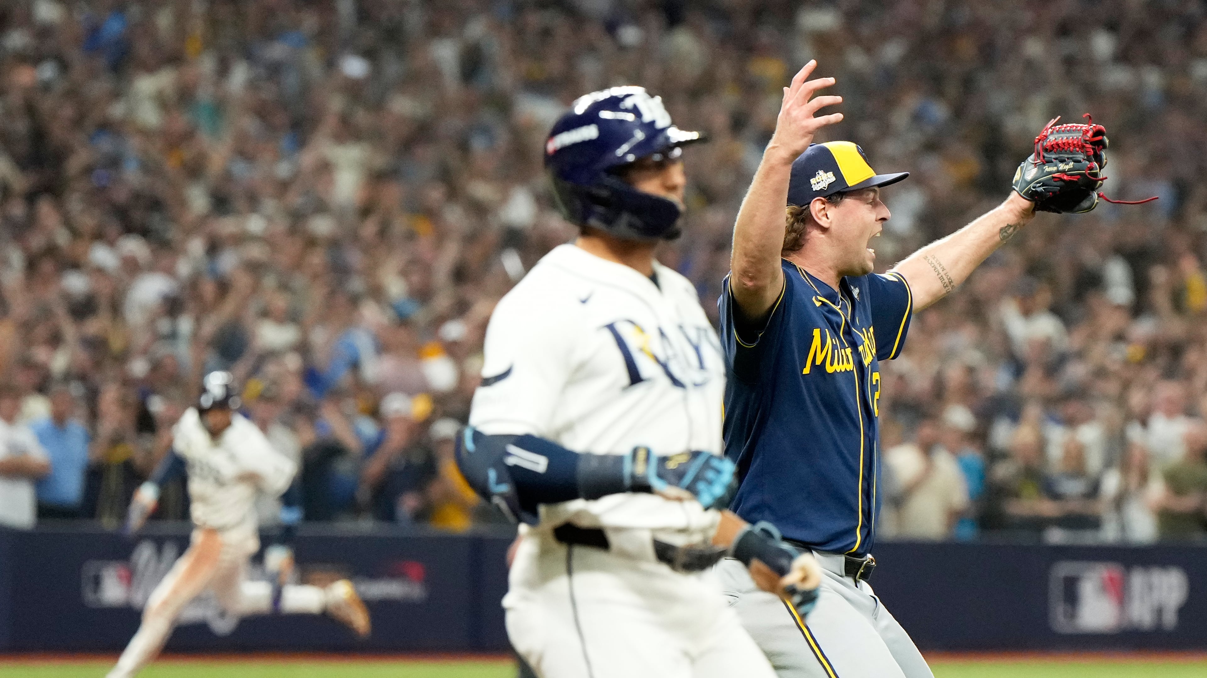 Milwaukee Brewers pitcher Trevor Megill celebrates their win in baseball's World Series against the Tampa Bay Rays, Wednesday, Oct. 28, 2026, in St. Petersburg, Fla. (AP Photo/Ashley Landis)