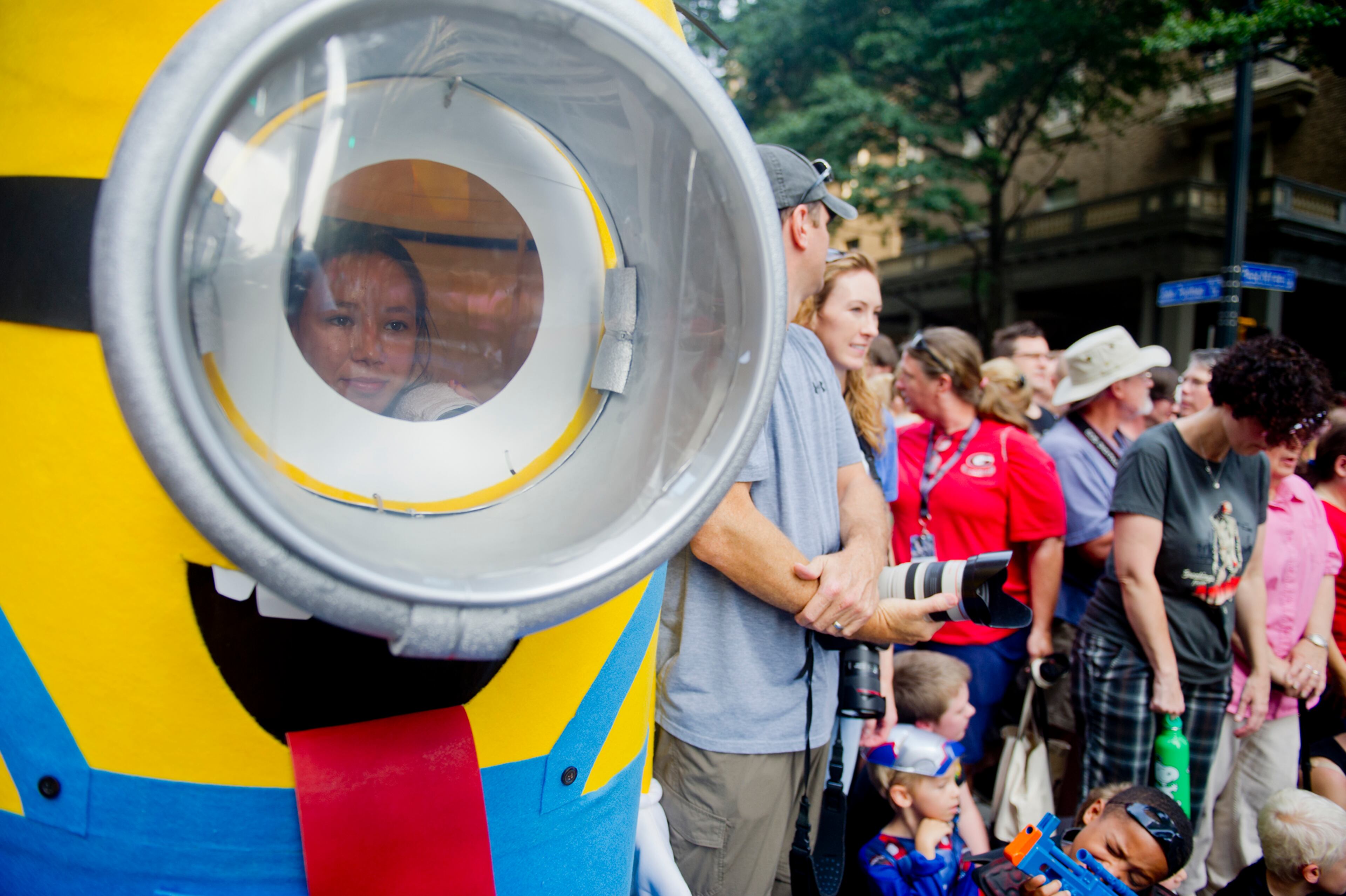 Dressed as a minion from the movie Despicable Me, Melina Le waits for the annual DragonCon parade through downtown Atlanta on Saturday, August 31, 2013. This year 57,000 people were expected to attend the five day long event which is in its 27th year. JONATHAN PHILLIPS / SPECIAL