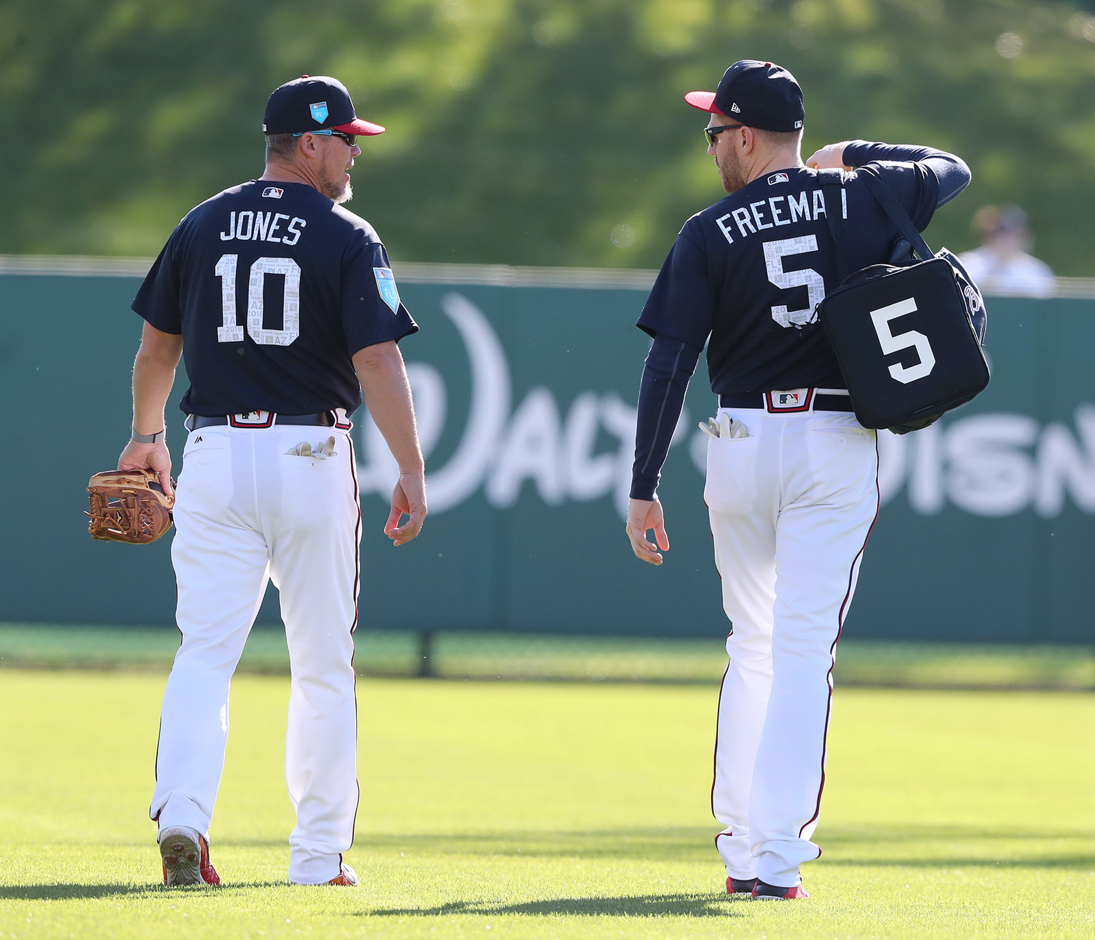 Feb 19, 2018 Lake Buena Vista: Braves recently elected Hall of Fame third baseman Chipper Jones walks with Freddie Freeman to the batting cages to watch him take batting practice while spending a day coaching spring training during the first full squad workout on Monday, Feb 19, 2018, at the ESPN Wide World of Sports Complex in Lake Buena Vista. Curtis Compton/ccompton@ajc.com