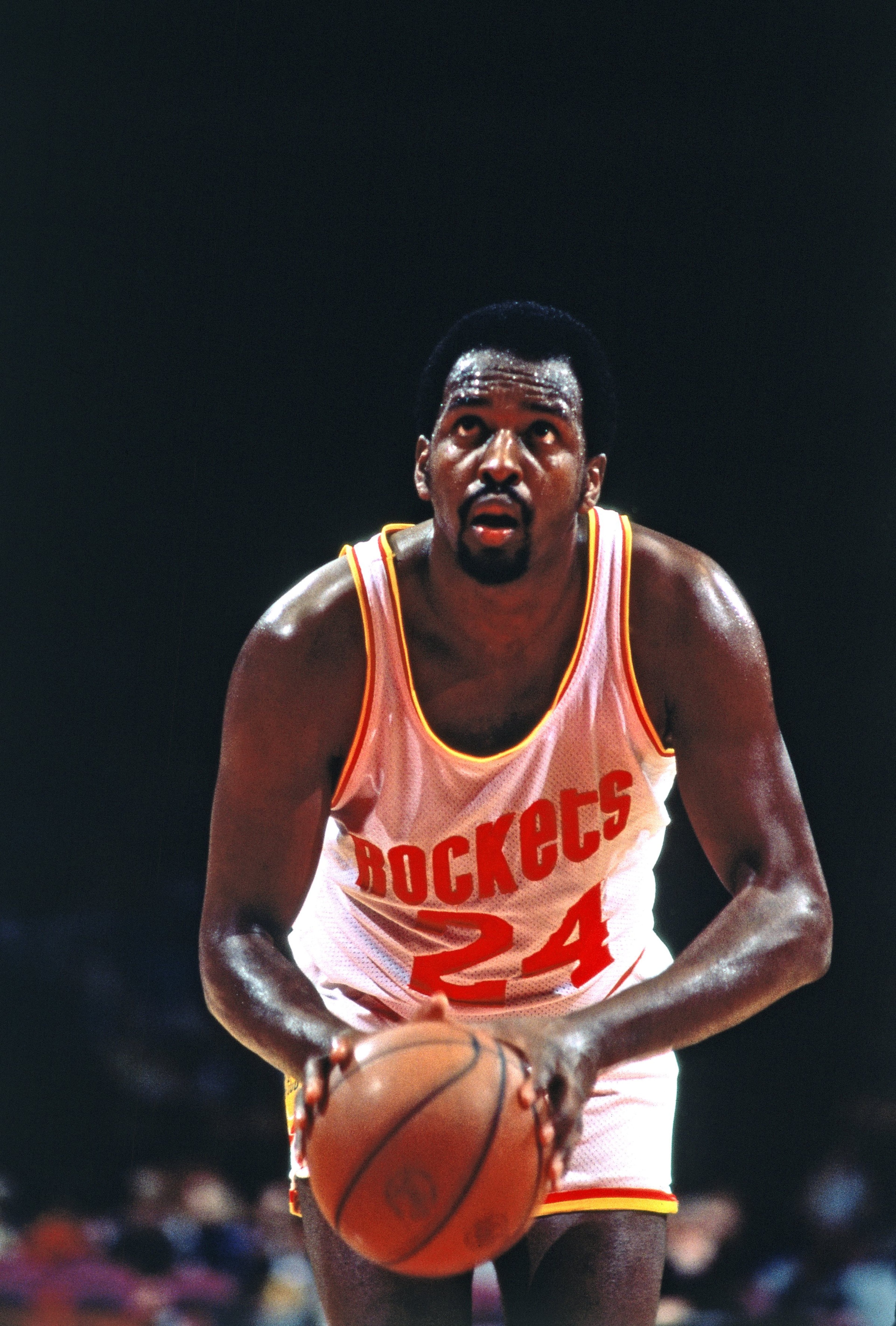 HOUSTON - 1980: Moses Malone #24 of the Houston Rockets shoots during a game played in Houston, Texas. NOTE TO USER: User expressly acknowledges and agrees that, by downloading and or using this photograph, User is consenting to the terms and conditions of the Getty Images License Agreement. Maditory Copyright notice: Copyright NBAE 1980 (Photo by Bill Baptist/NBAE via Getty Images)
