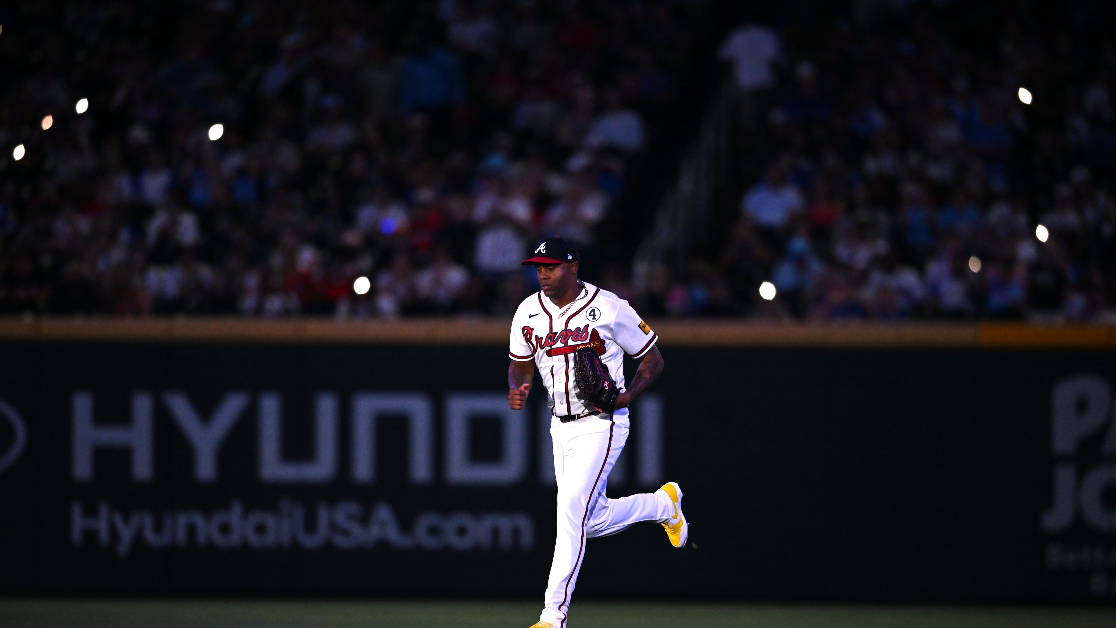 Atlanta Braves pitcher Raisel Iglesias (26) runs onto the baseball filed during the ninth inning of a baseball game at Truist Park, Tuesday, June 2, 2026, in Atlanta. Atlanta Braves won 4-3 over Toronto Blue Jays. (Hyosub Shin/AJC)