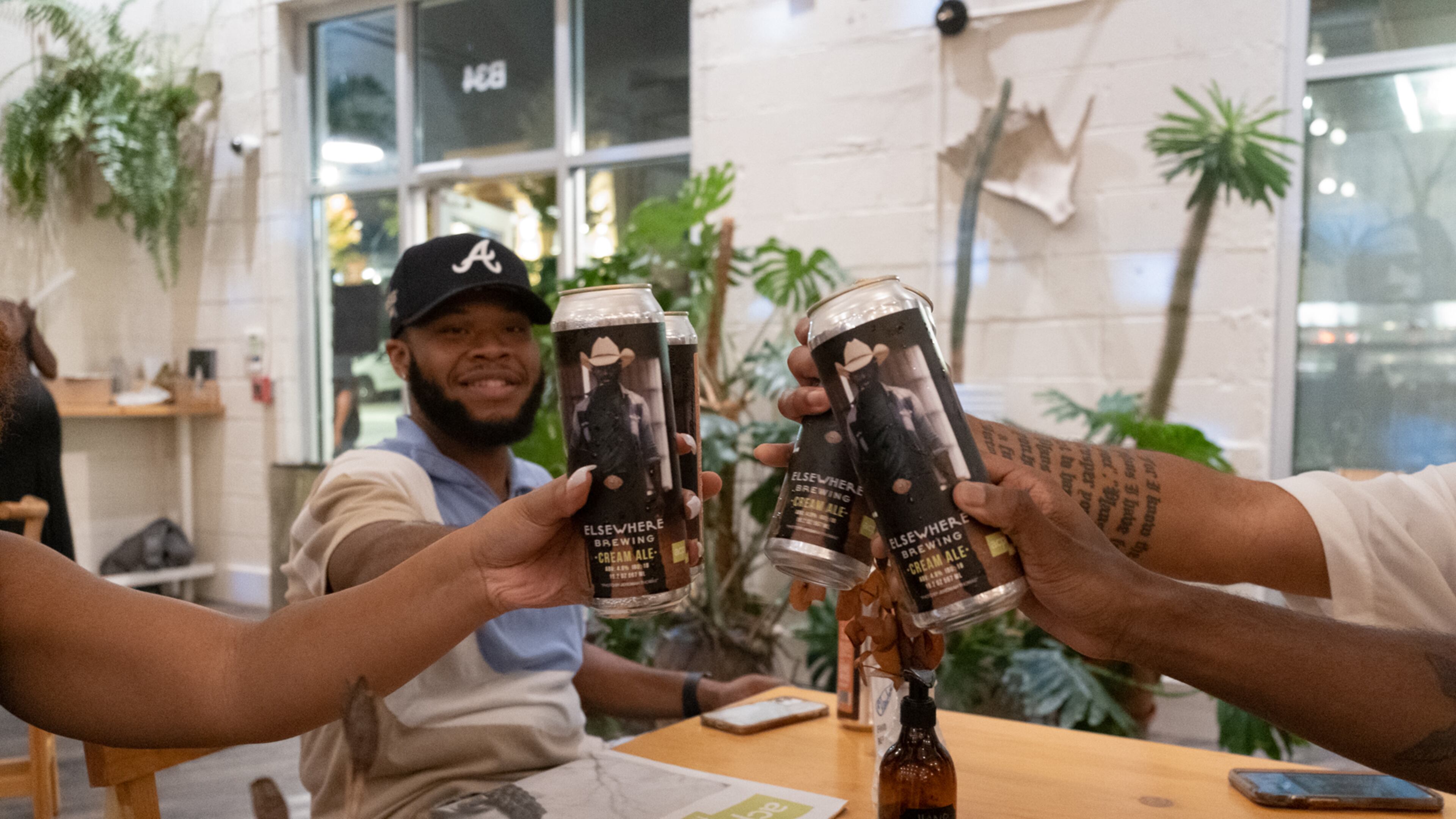 Art beer featuring ACP Emerging Artist Fellow Jeremiah Thomas at Elsewhere Brewing. Atlanta Celebrates Photography includes a project that put art by Thomas on cans from Elsewhere Brewing.