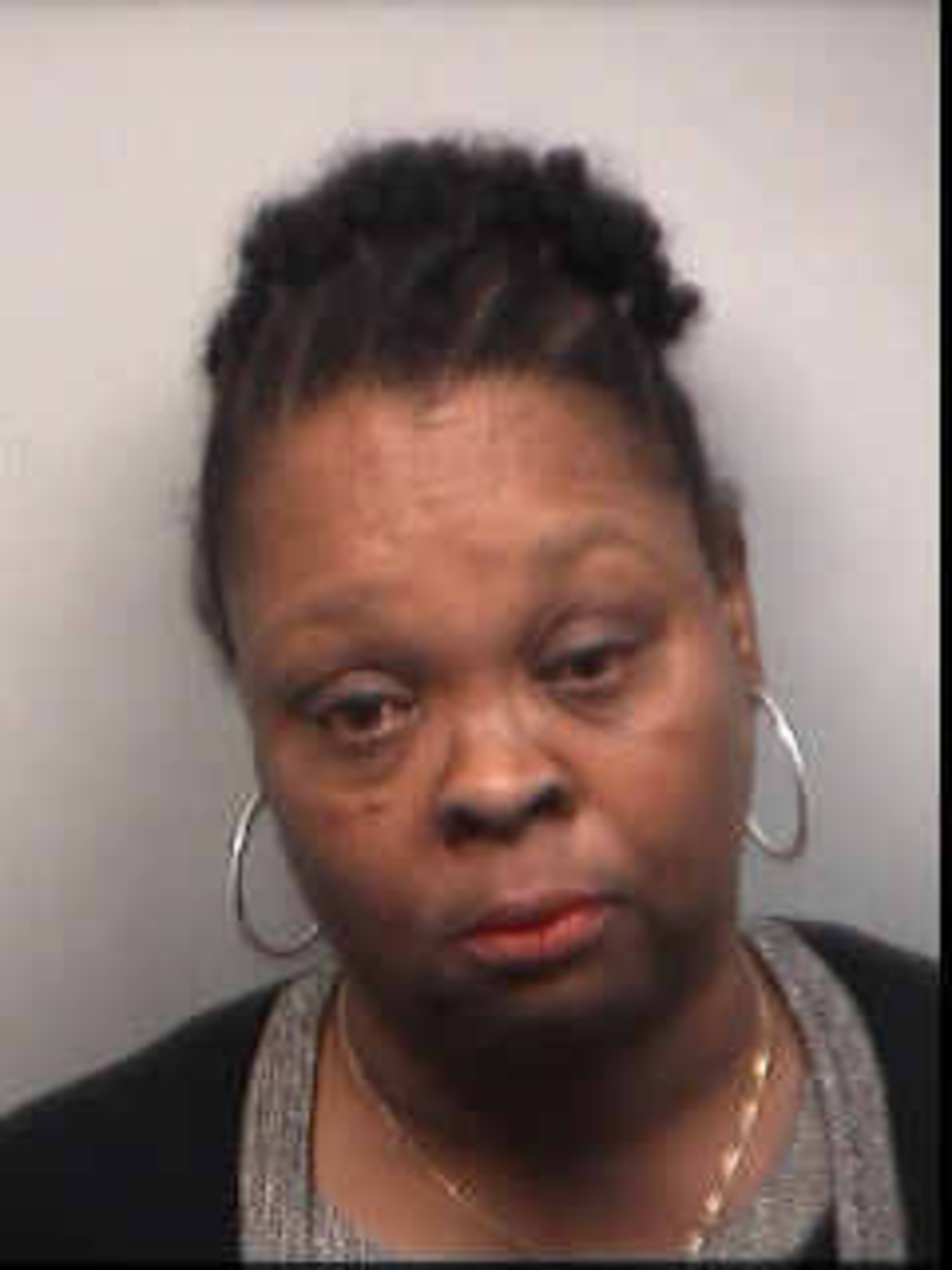 Diane Buckner-Webb, 51, teacher, Dunbar Elementary, was booked into the Fulton County Jail on $50,000 bond, according to jail records. She is charged with racketeering, false statements and writings.